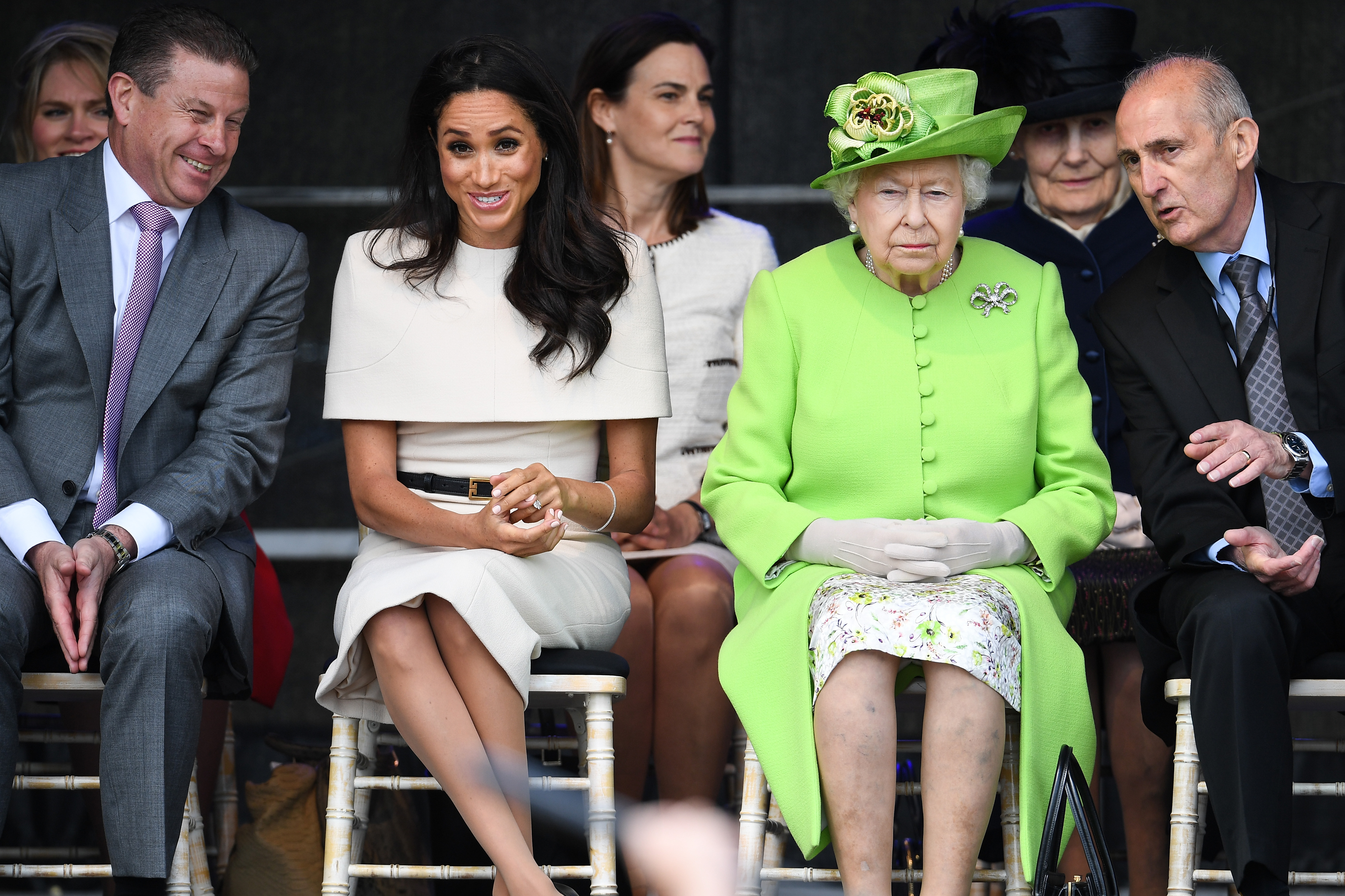 Who are the key players at war with Meghan and what is the “Firm of Eight”?