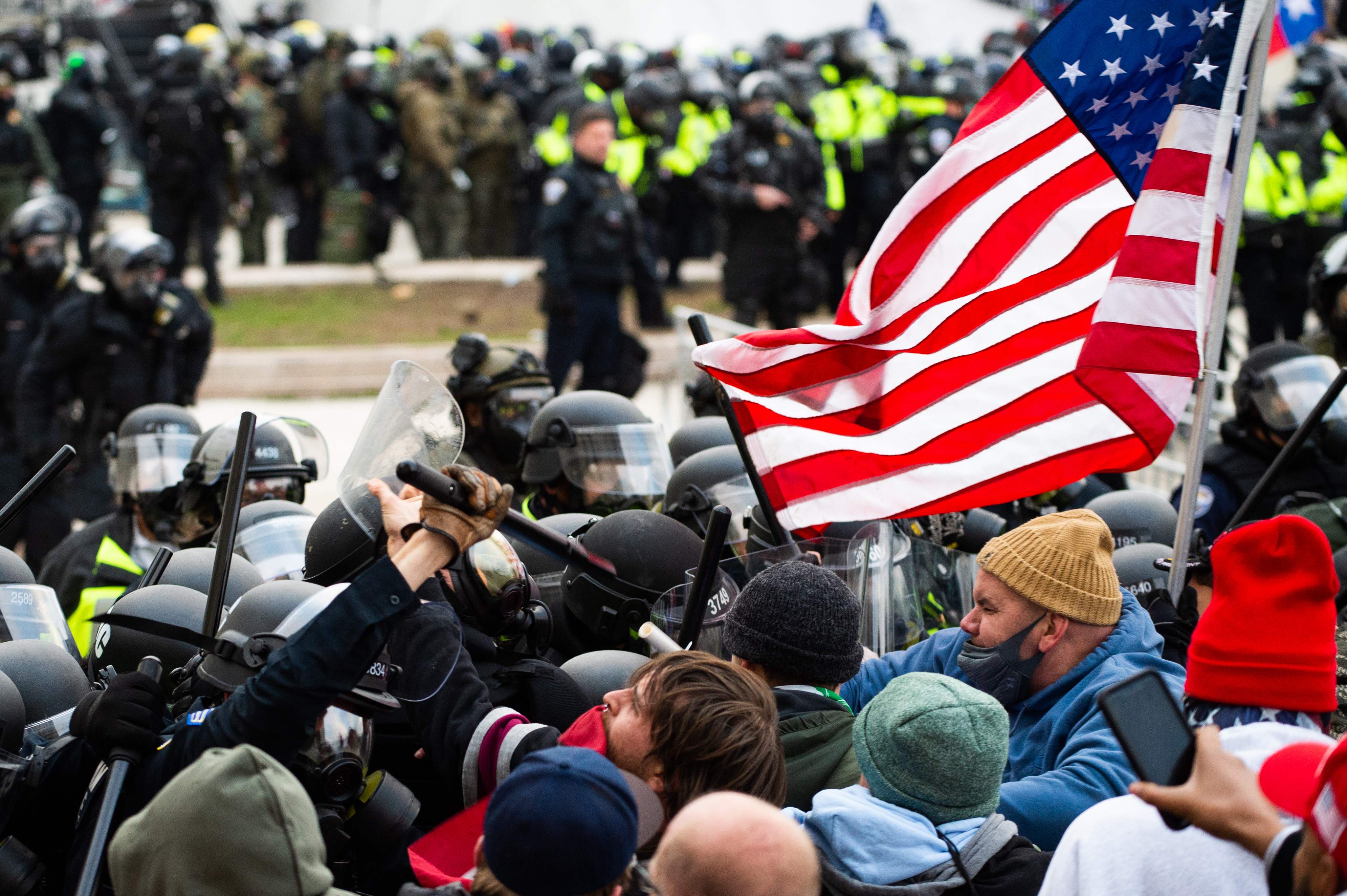 Former Trump aide charged with participating in the deadly US Capitol siege