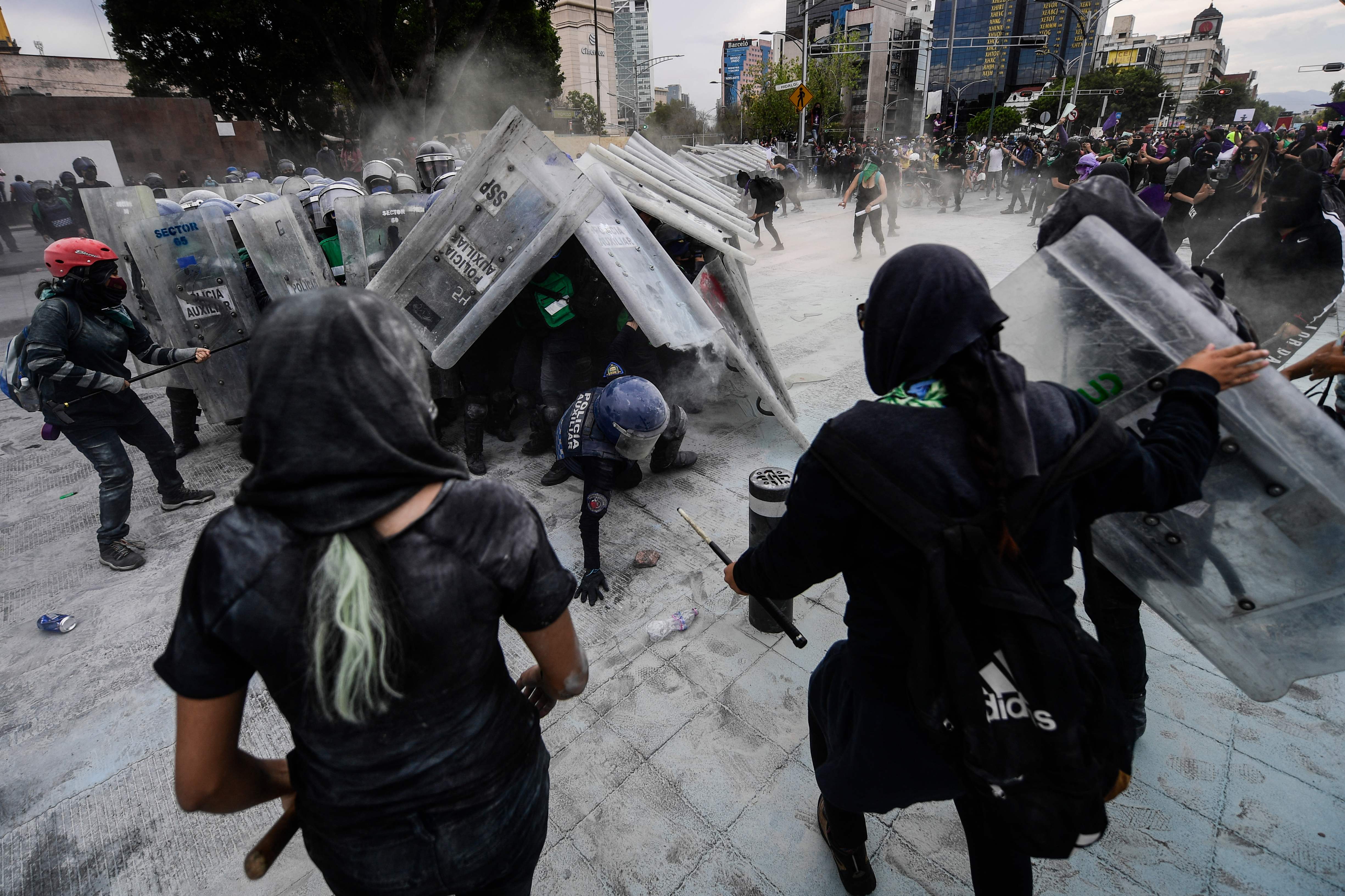 Police clash with protesters on Women’s Day march in Mexico City