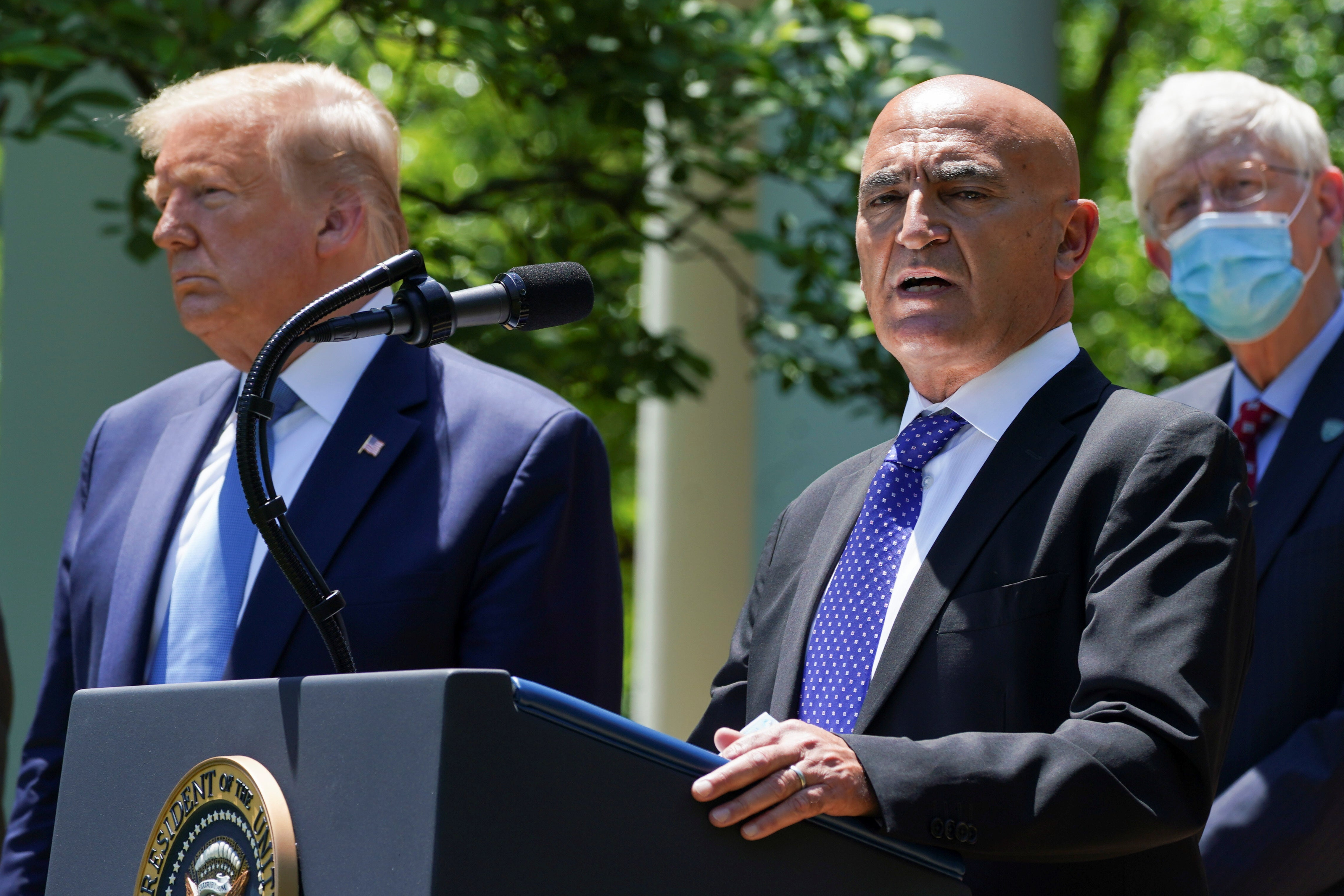 White House puts former pharma boss in charge of vaccine development and he warns 12 to 18 month timeline Donald Trump calls too slow is 'realistic'