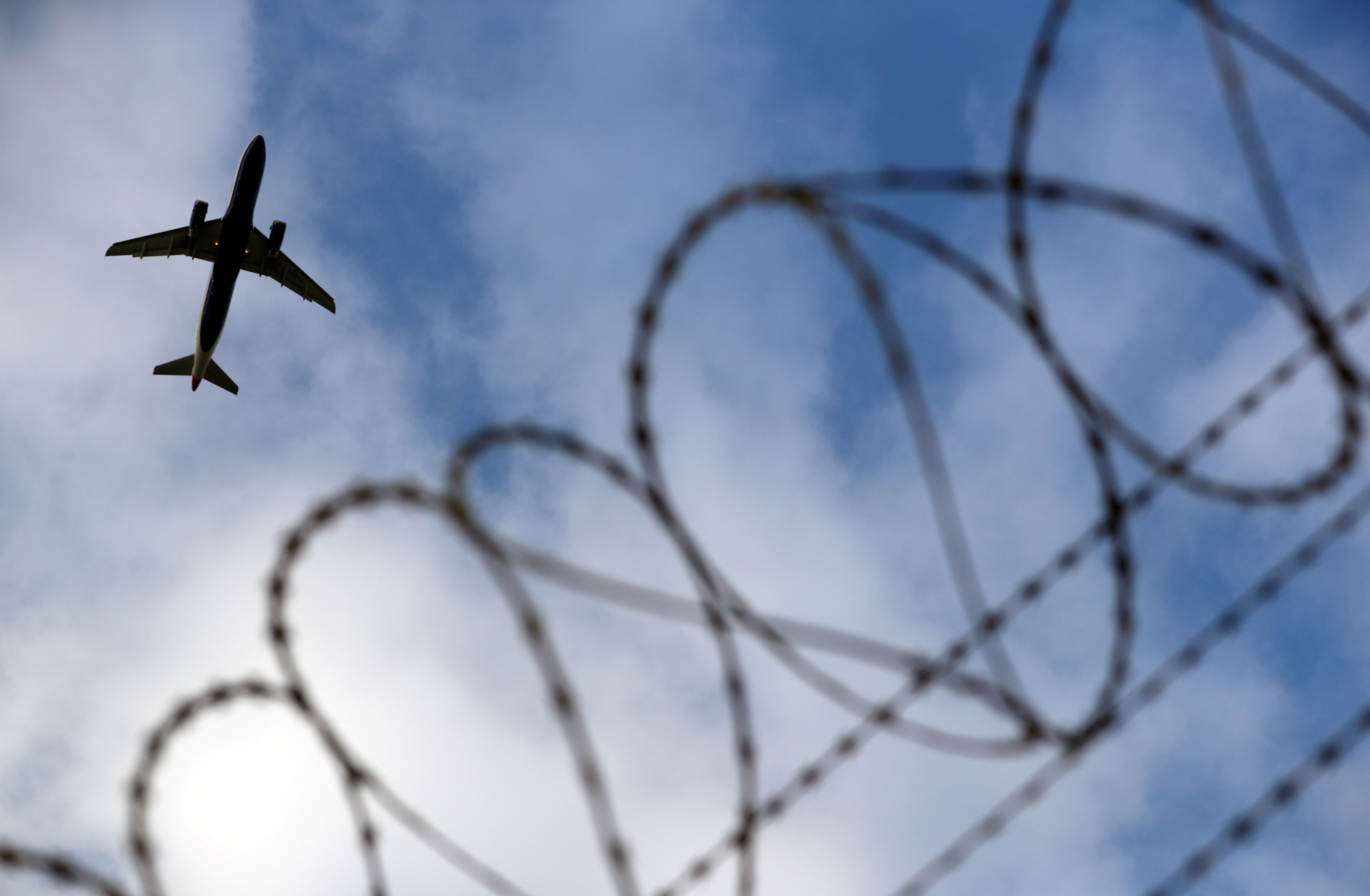 Cabbie found dead in his taxi at Heathrow