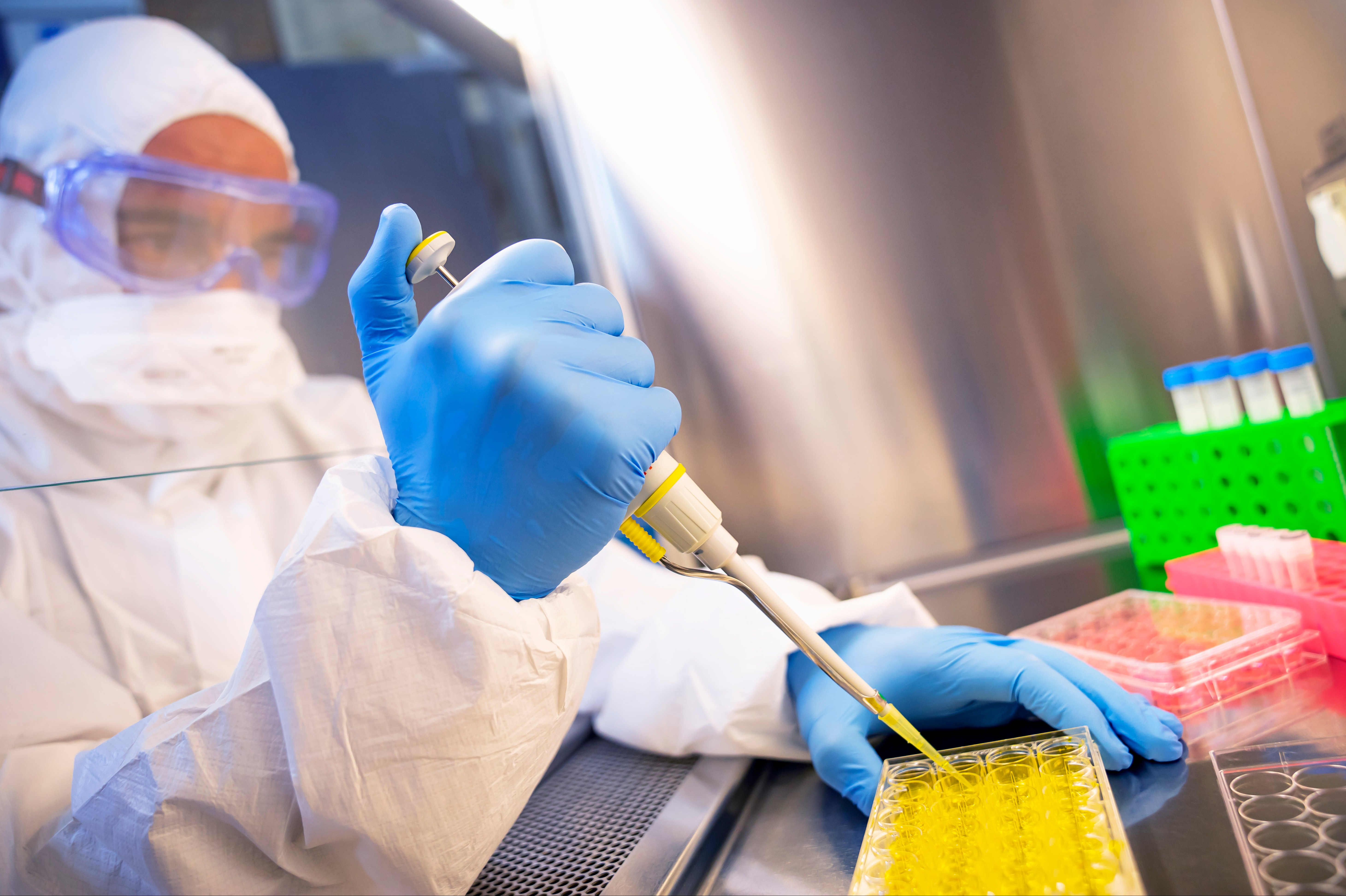 Coronavirus 2019-nCoV theme. Tired and sick doctor is finding cure for corona virus