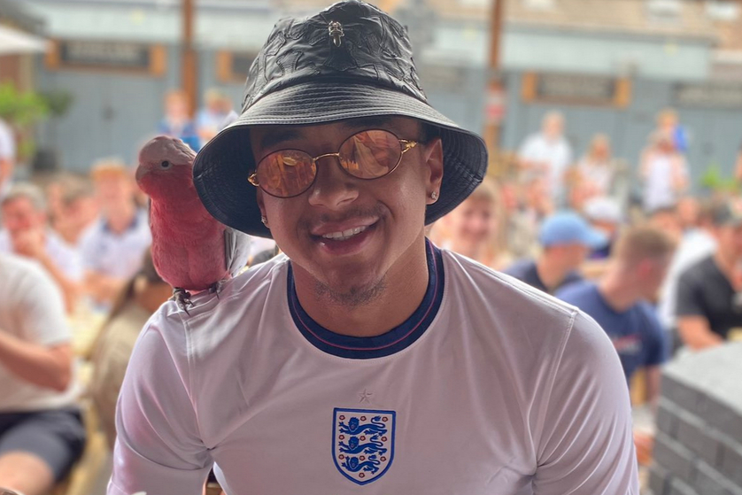 Jesse Lingard cheers on England against Croatia at Euros in Declan Rice shirt... and with parrott on shoulder!