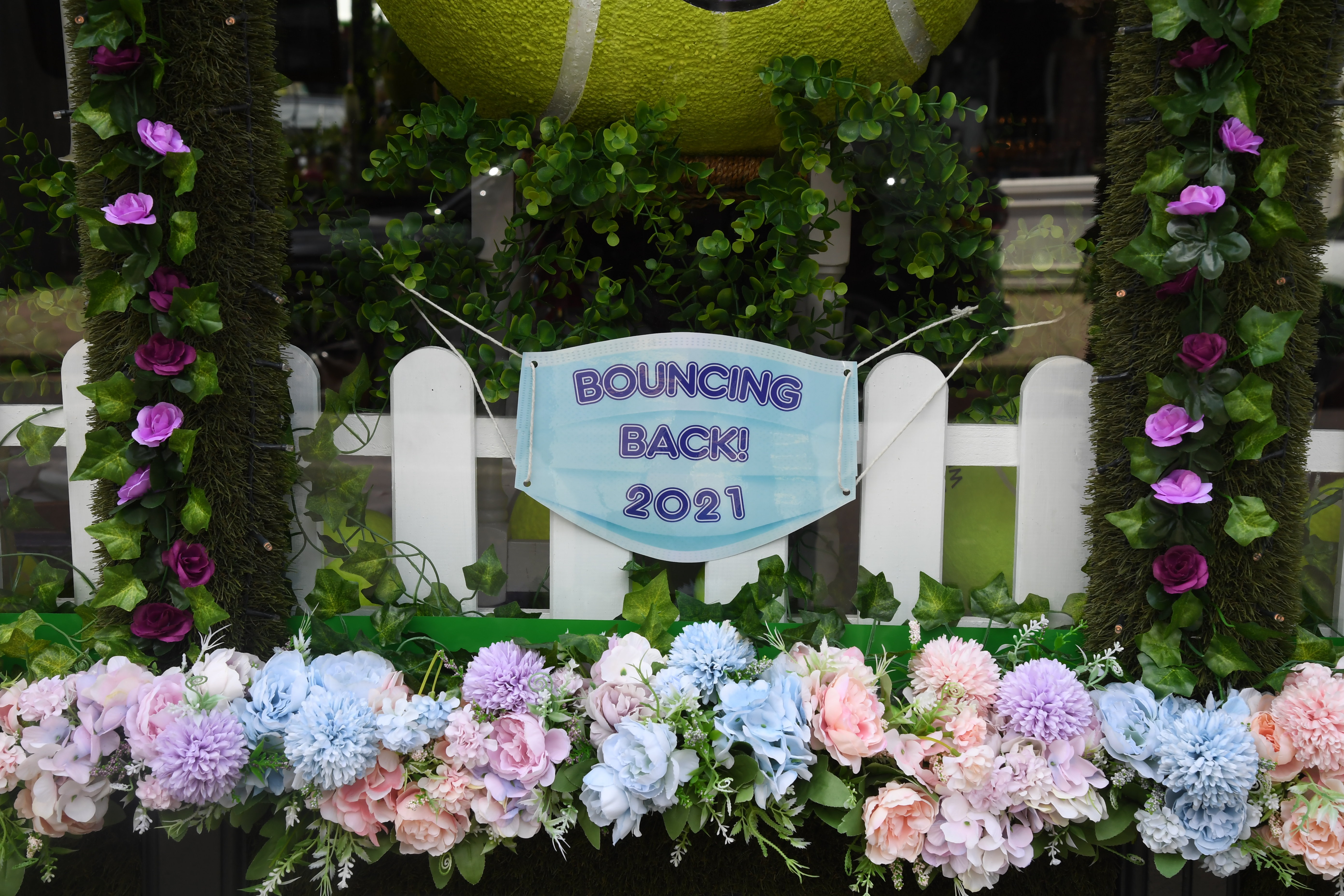 Wimbledon springs back to life for return of tennis fans