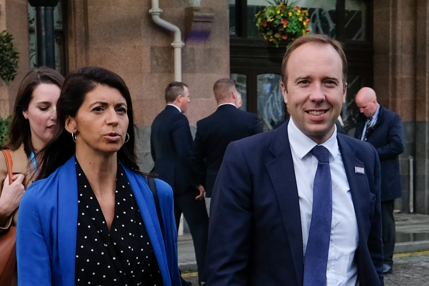 Matt Hancock, Secretary of State for Health and Social Care walks with Gina Coladangelo
