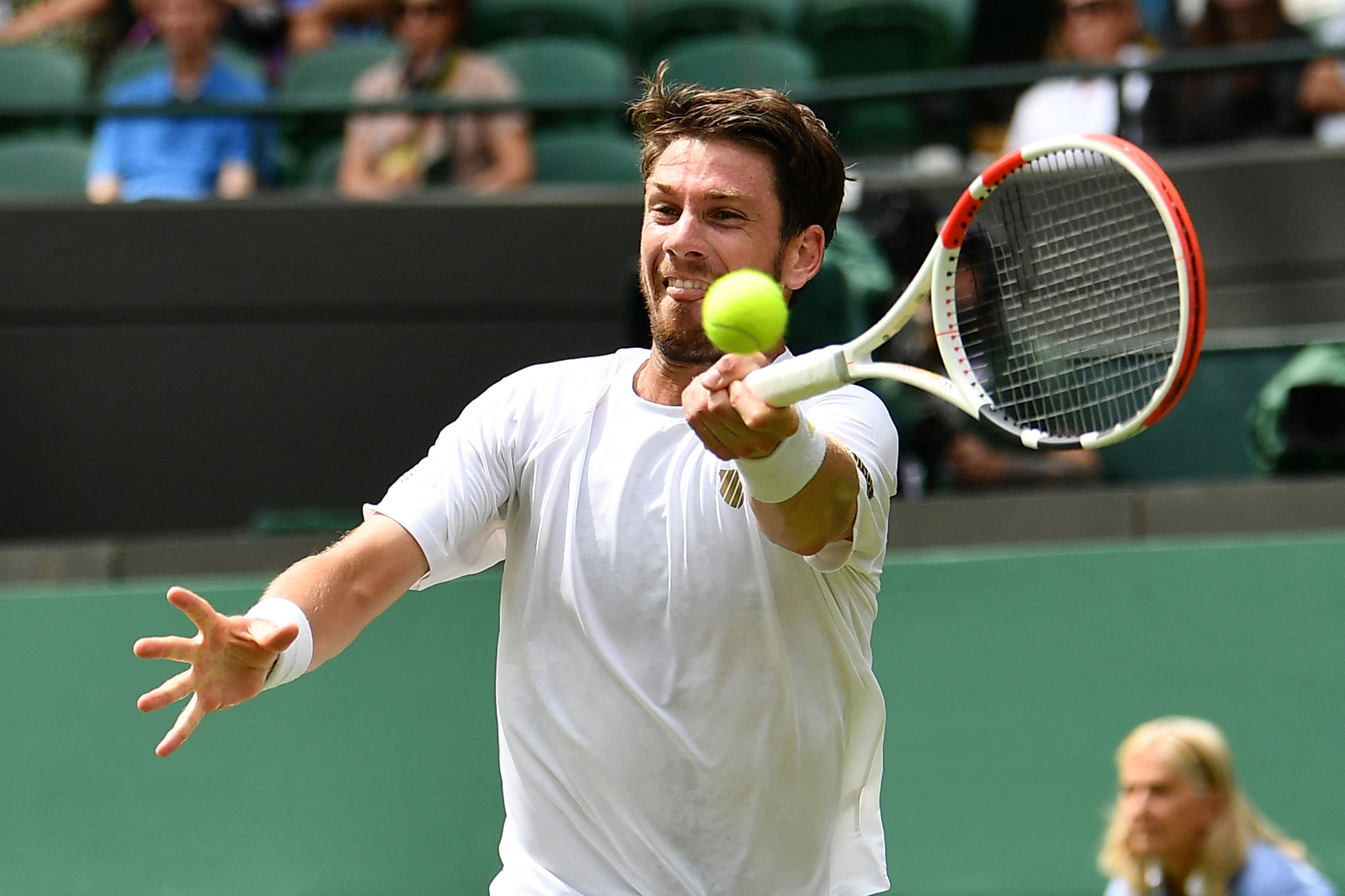 Cameron Norrie sets up third-round encounter with Roger Federer at Wimbledon