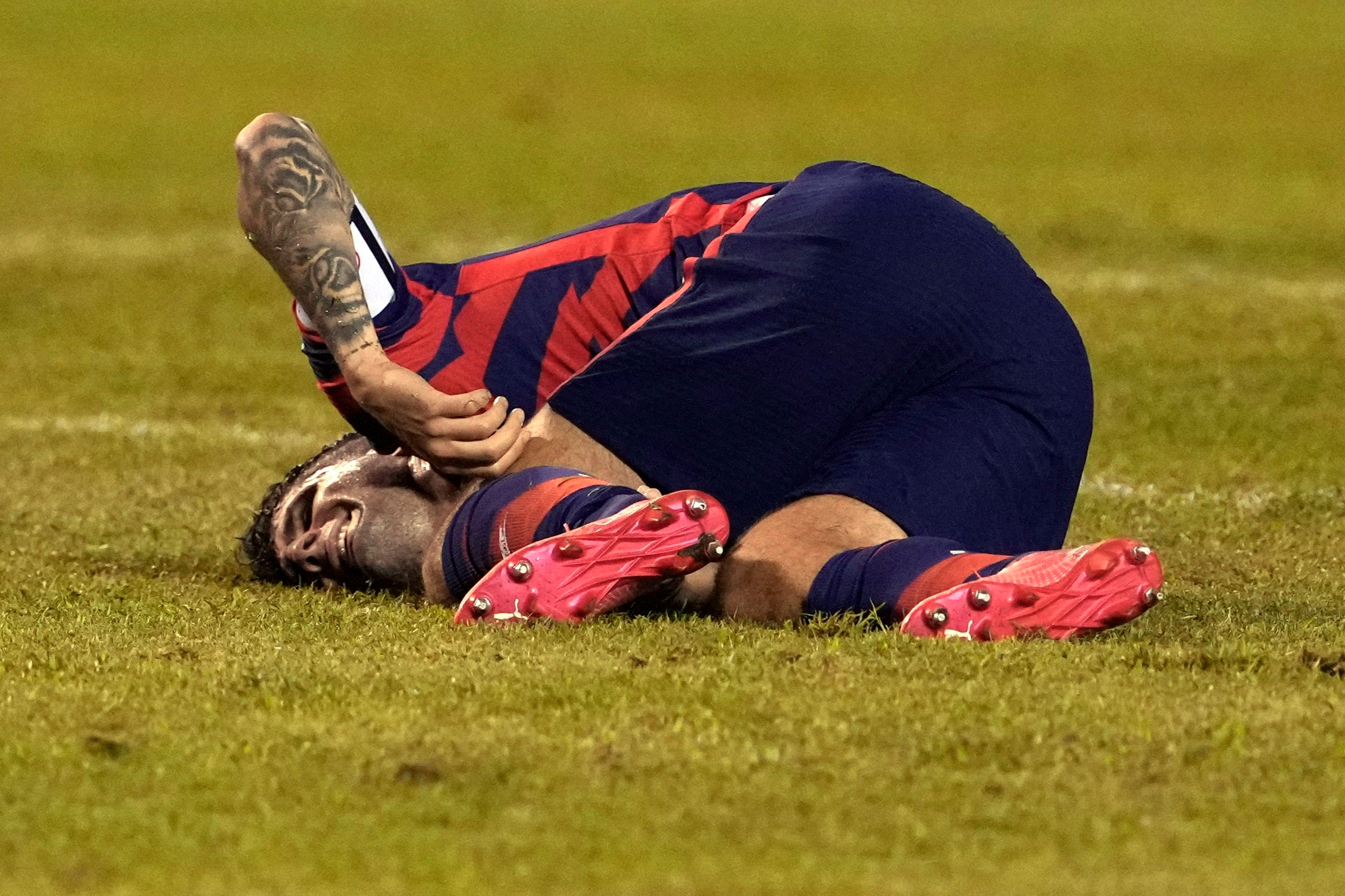 Christian Pulisic injury: Chelsea FC face anxious wait after USA winger suffers ankle problem in Honduras win