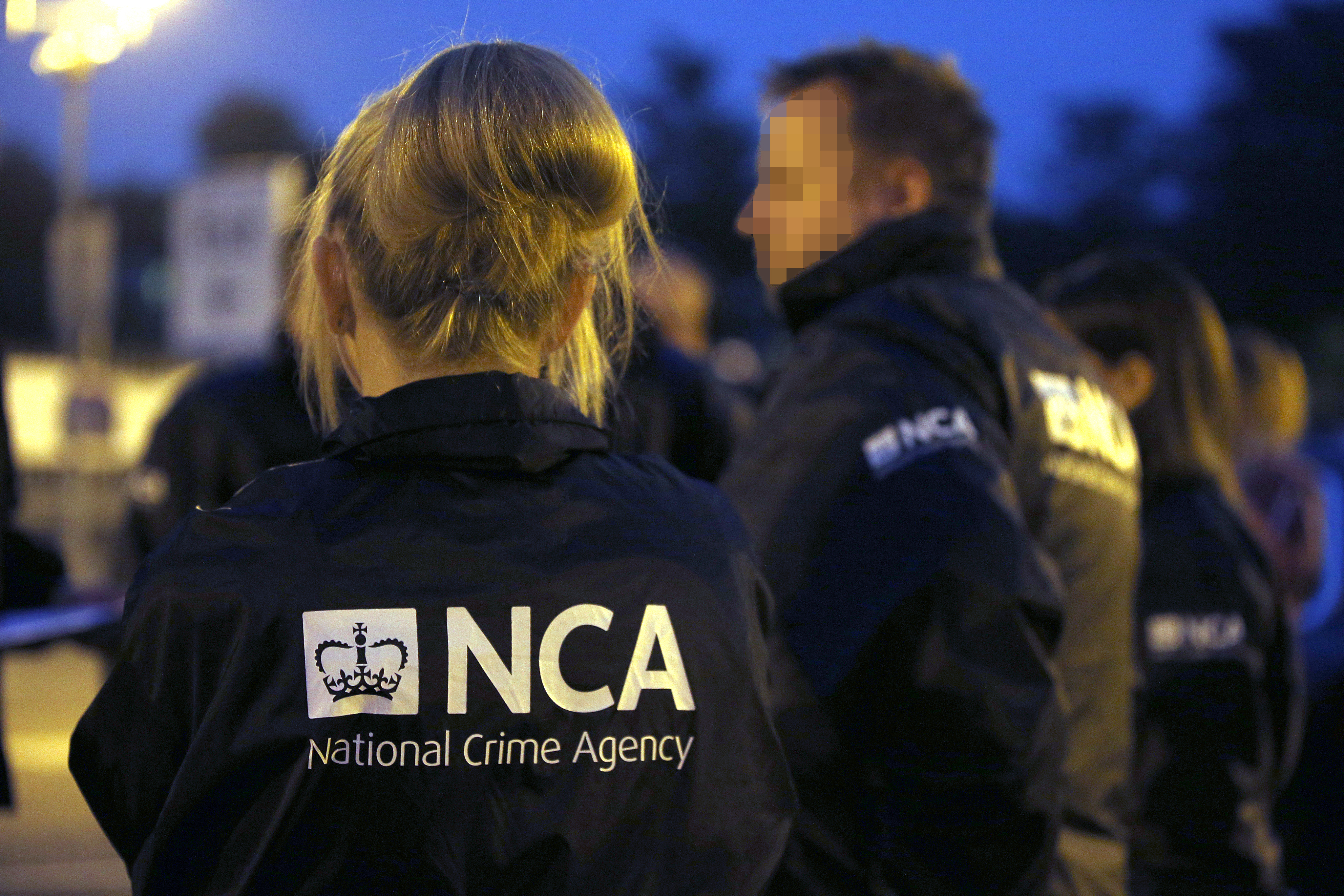 Officers from the newly formed National Crime Agency take part in a dawn raid on a property in Wanstead Road, Bromley, Kent