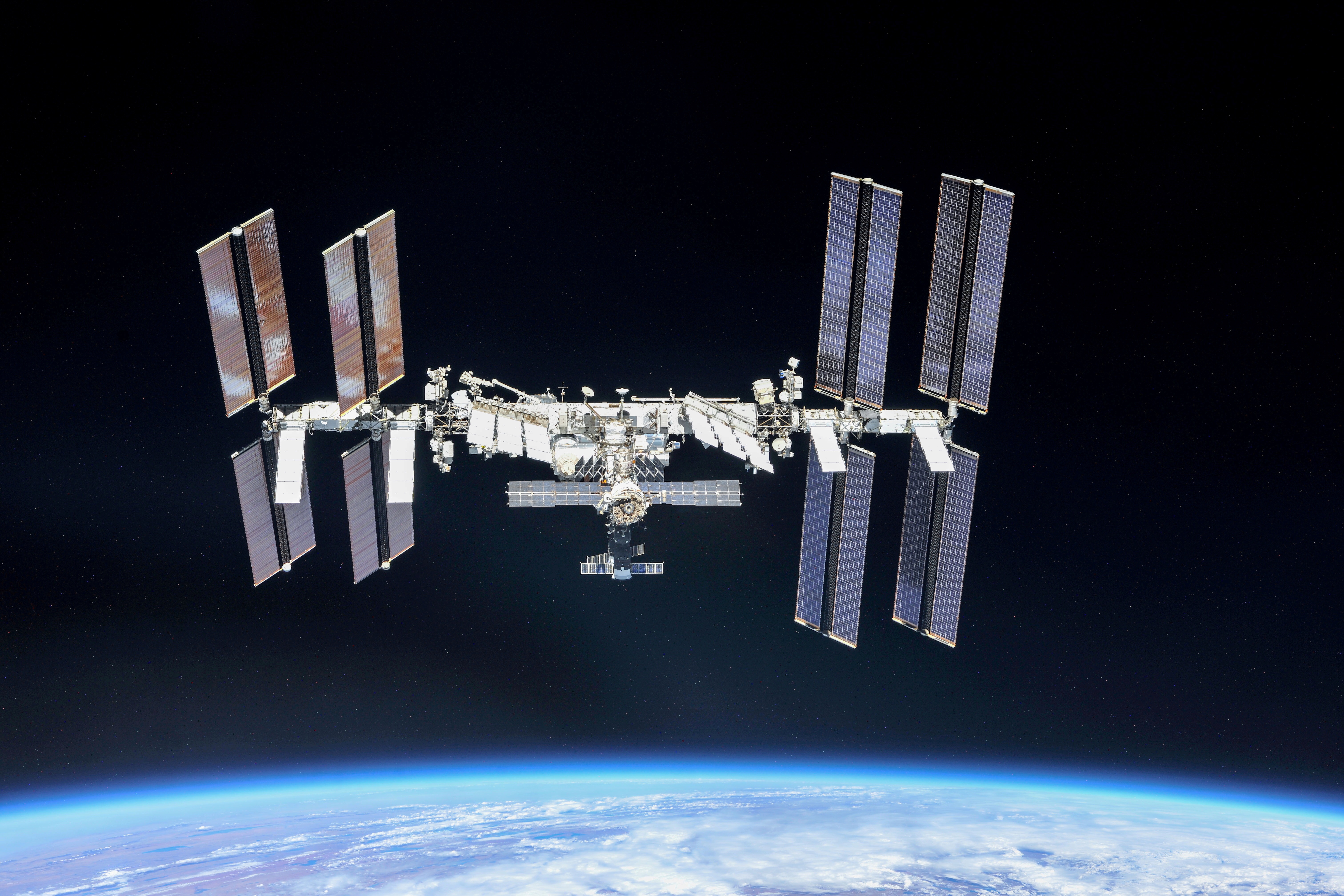 International Space Station photographed by Expedition 56 crew members from a Soyuz spacecraft after undocking