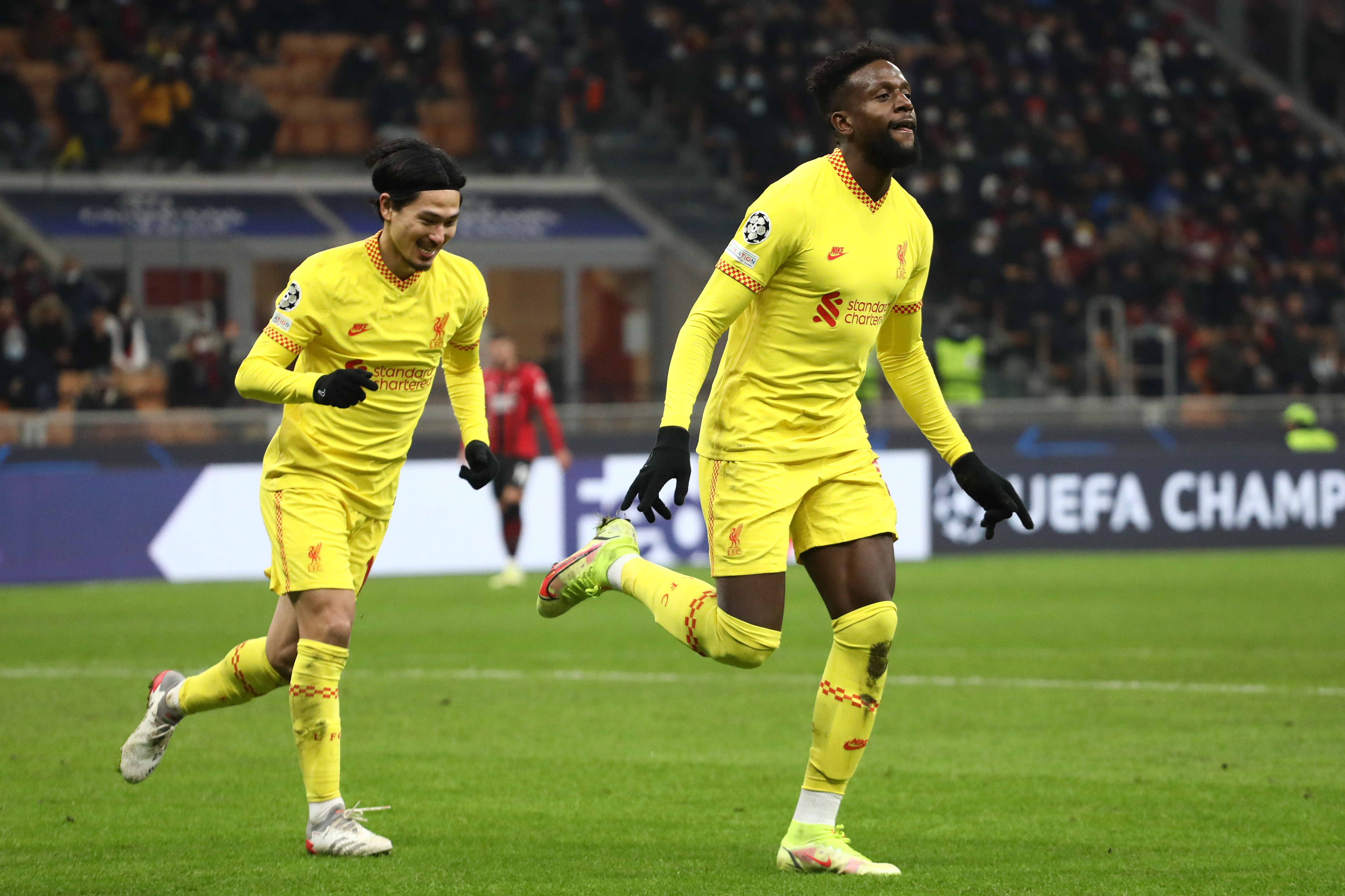 AC Milan 1-2 Liverpool: Mo Salah and Divock Origi ensure Reds maintain perfect Champions League record