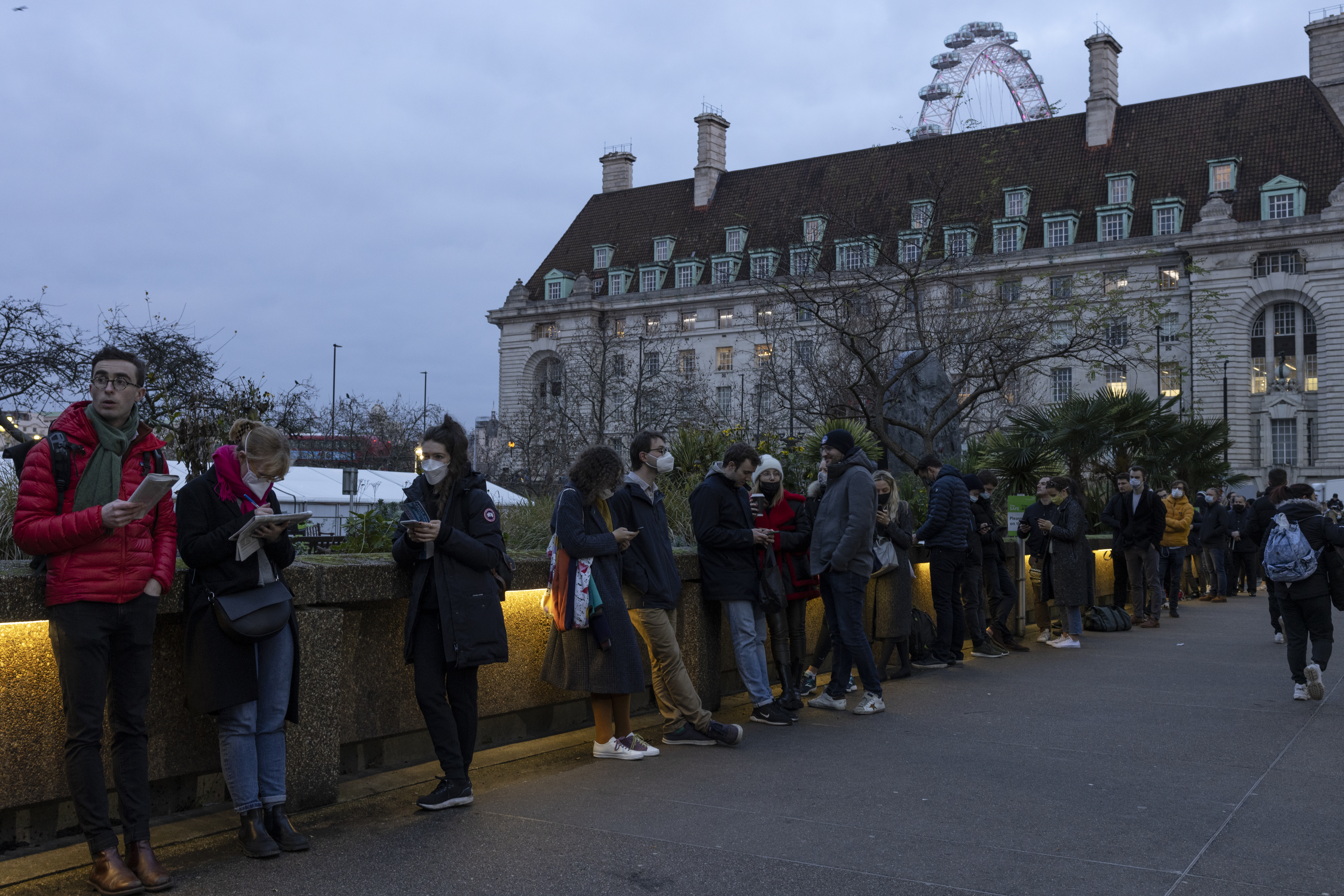 Londoners join massive pre-dawn queues for Covid booster vaccine