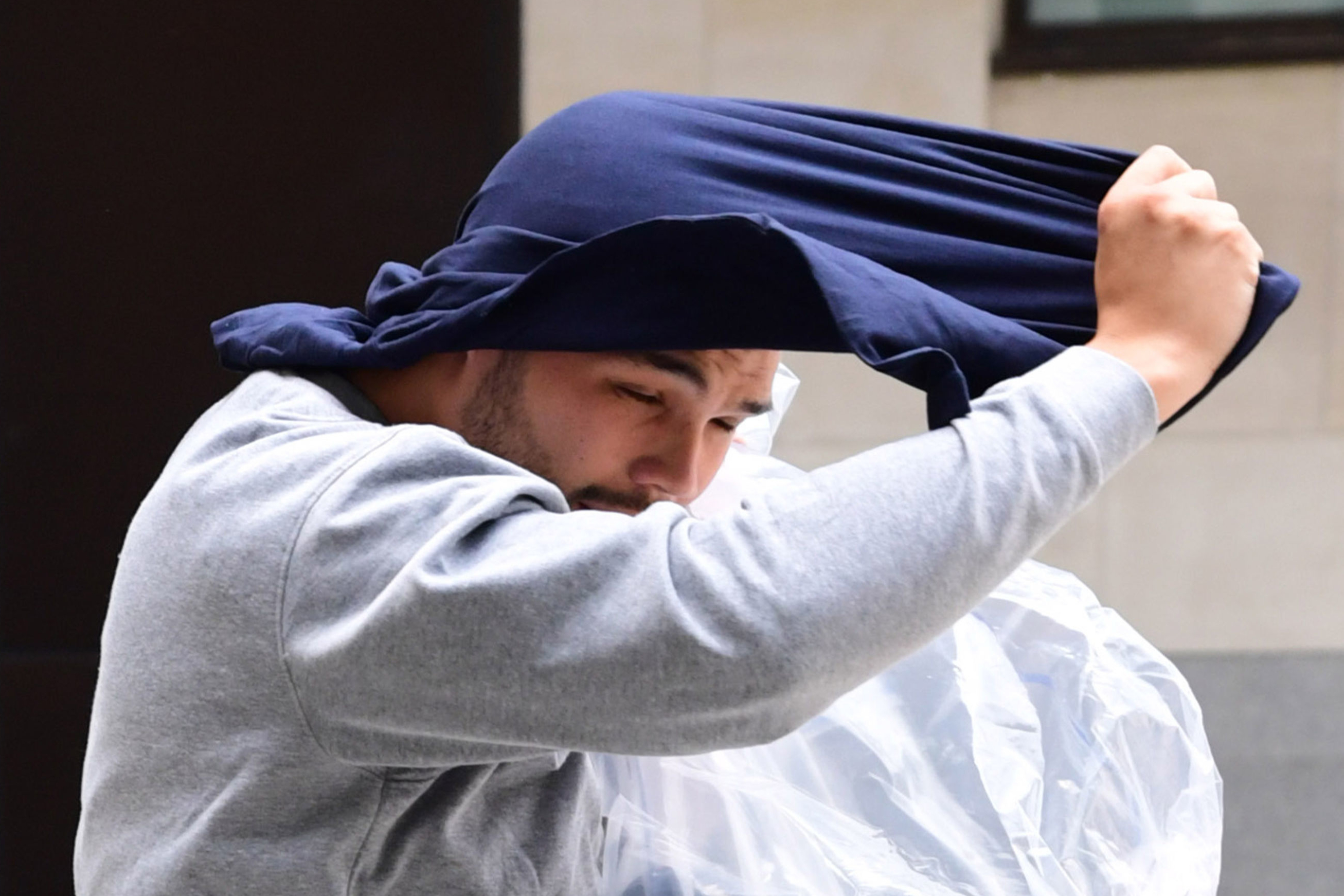Defendant in bedroom in dressing gown denies Chris Whitty assault 