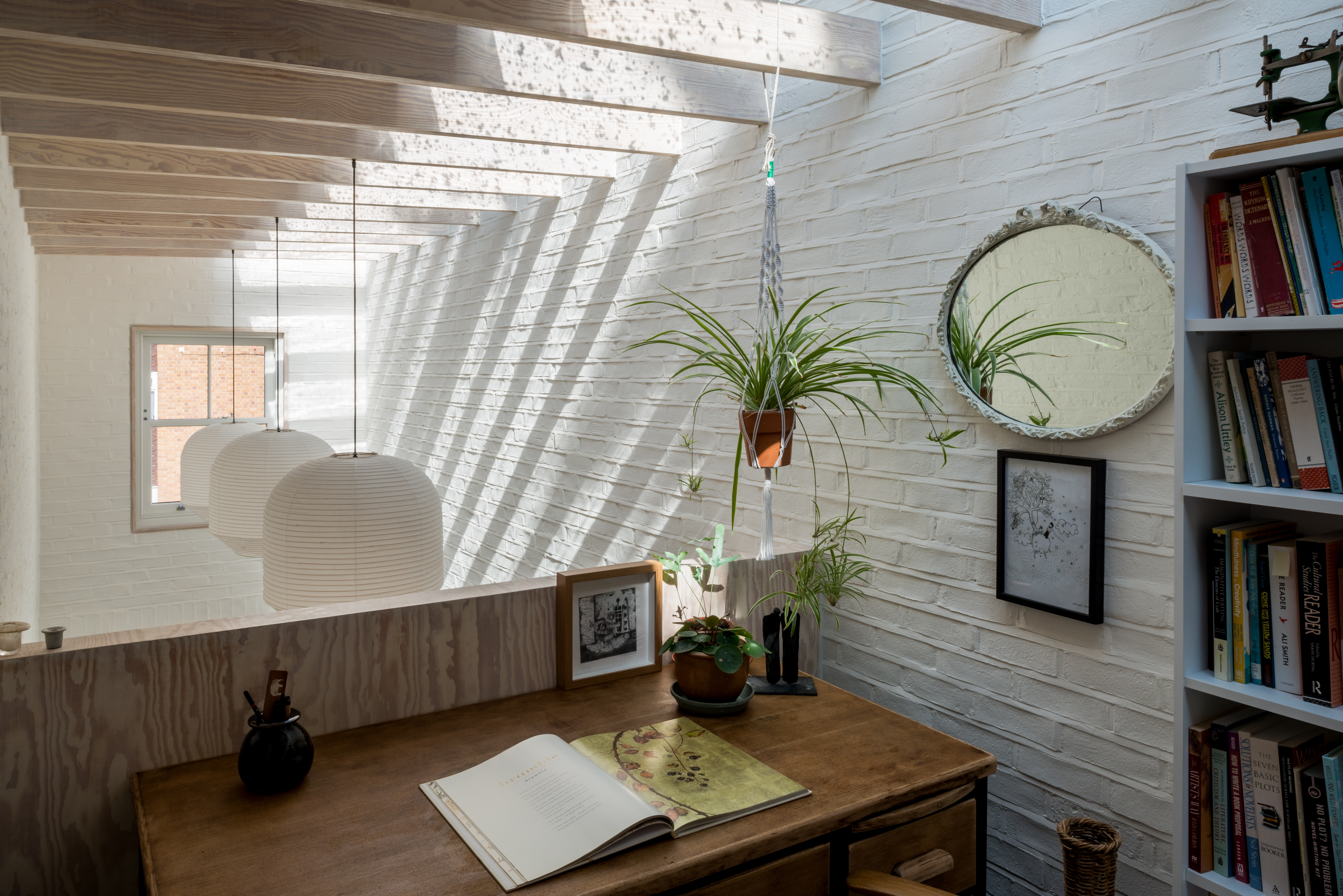 An artist’s mews: inside the gloomy Brockley house extended into a light-filled home with creative workspaces