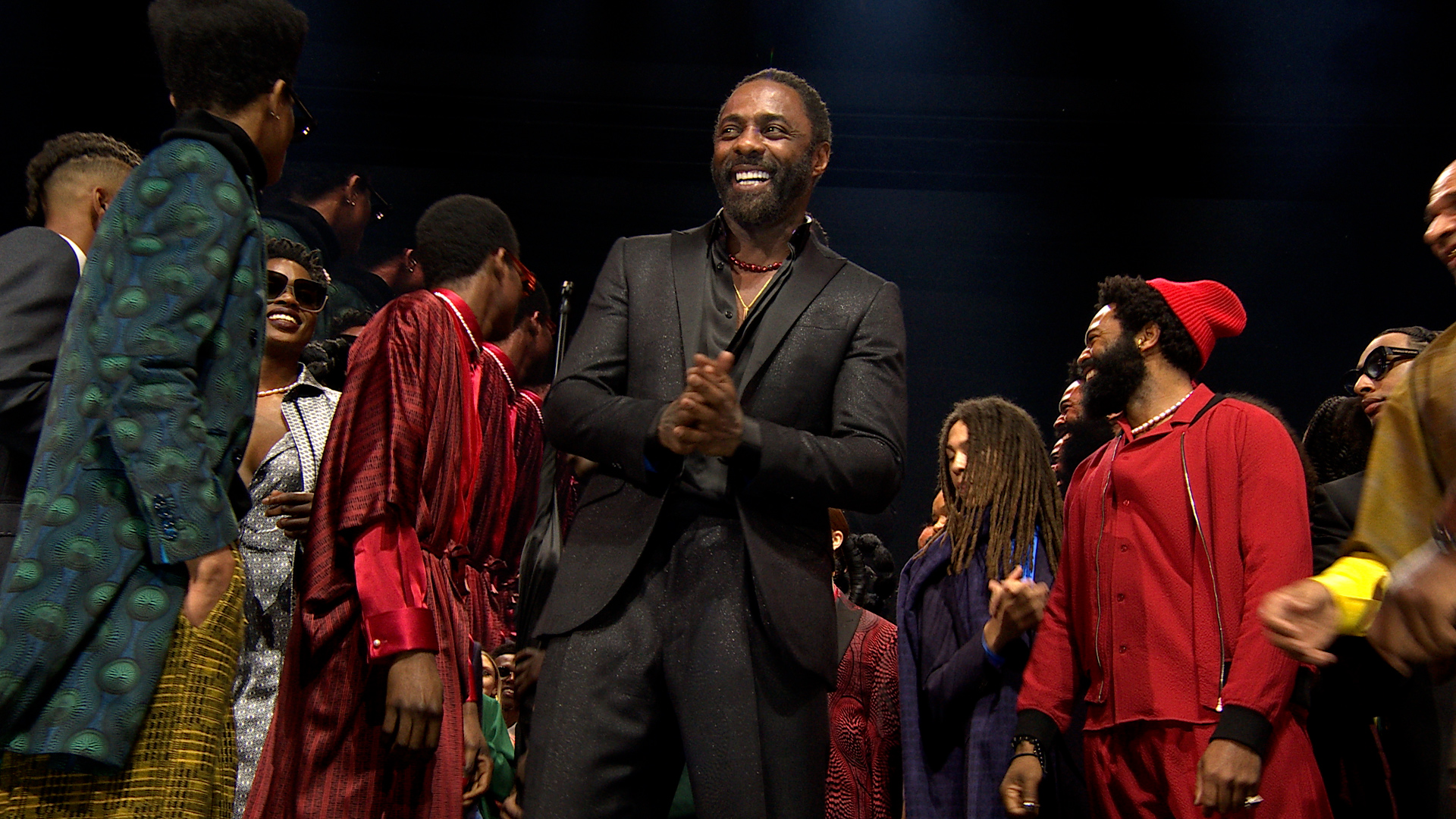 Idris Elba swaggers onto Ozwald Boateng’s catwalk 