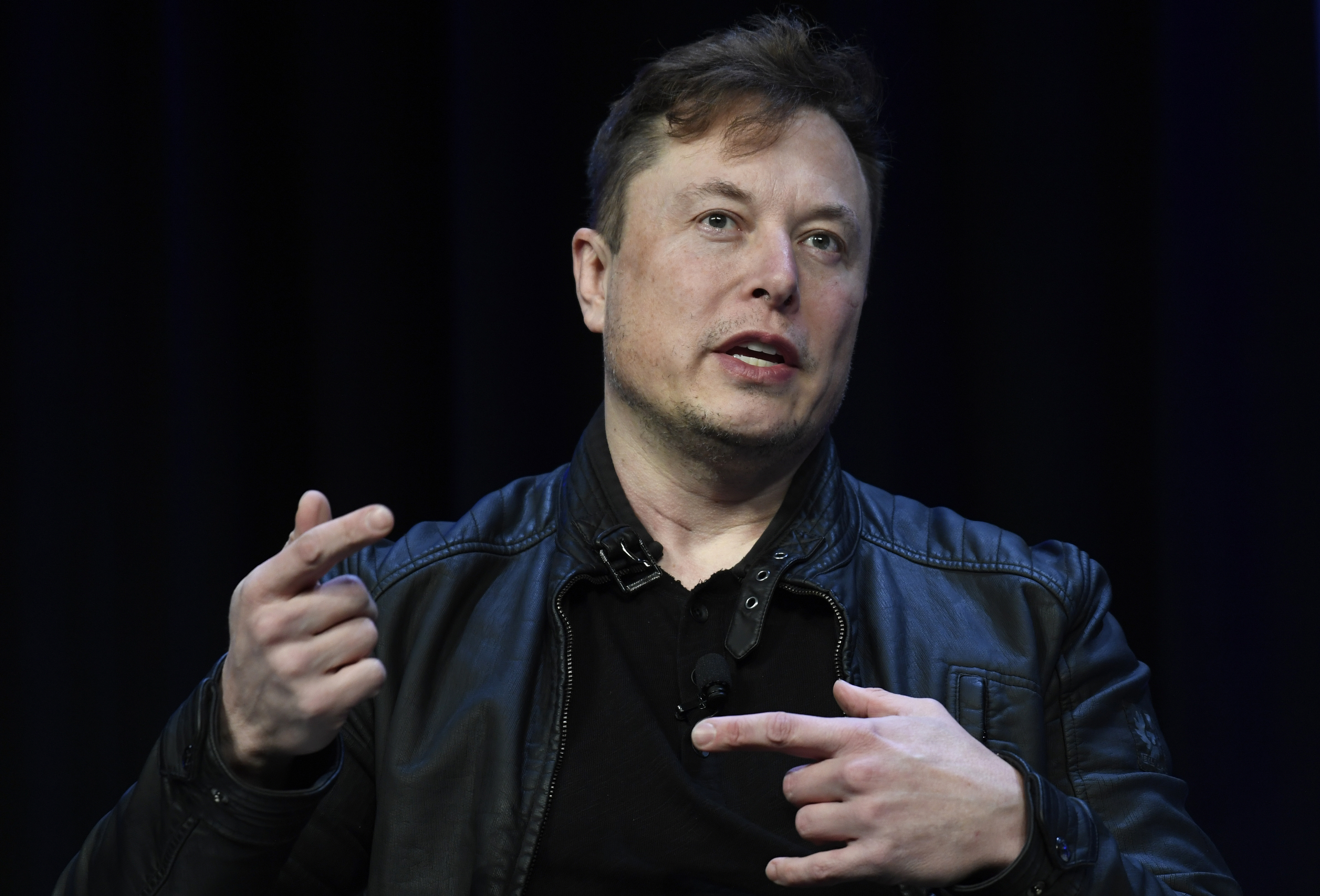 Musk promises ‘robotaxis’ by 2024 as Tesla posts record results