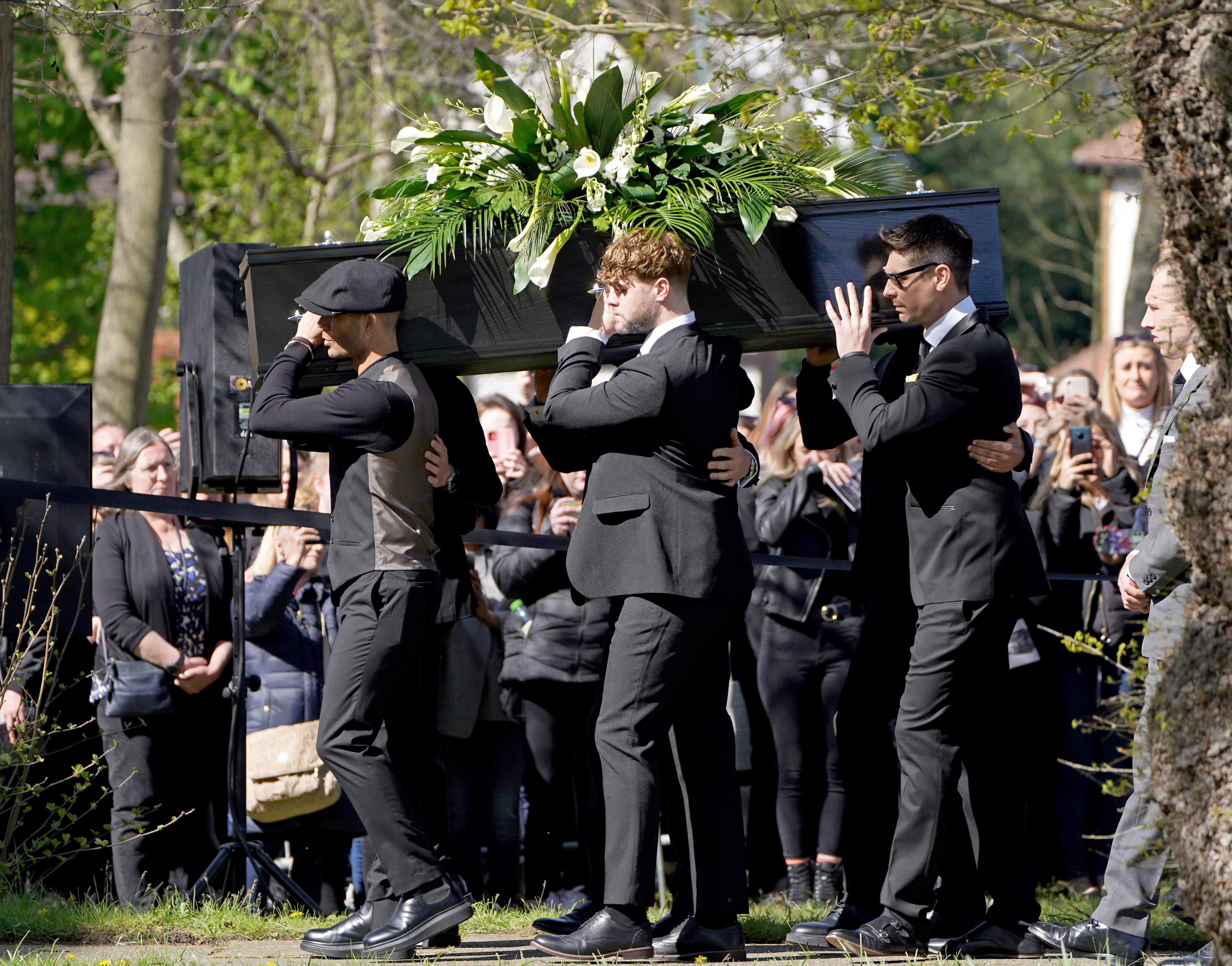 Tom Parker’s bandmates from The Wanted carry his coffin as funeral begins