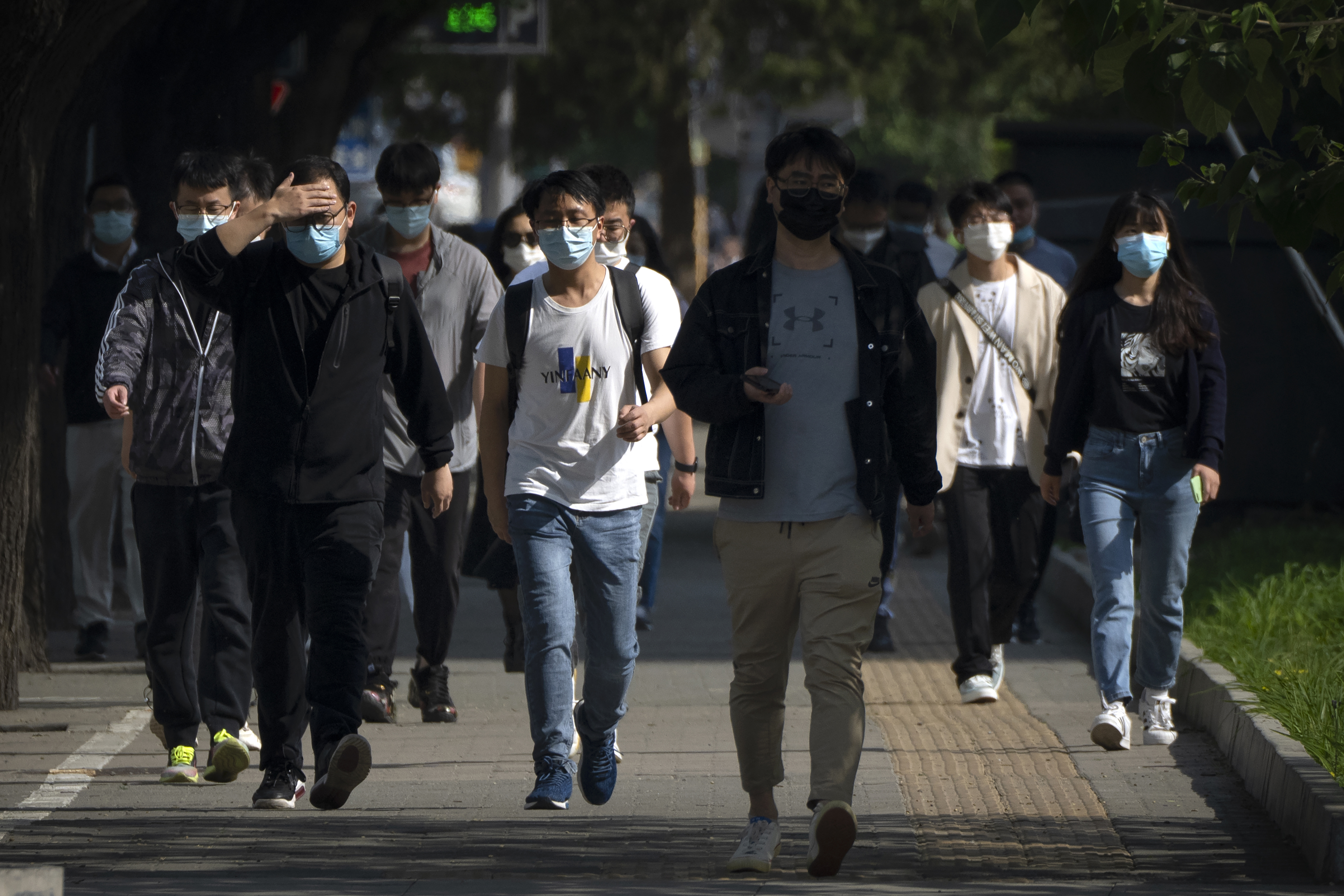 Beijing Covid people return to work