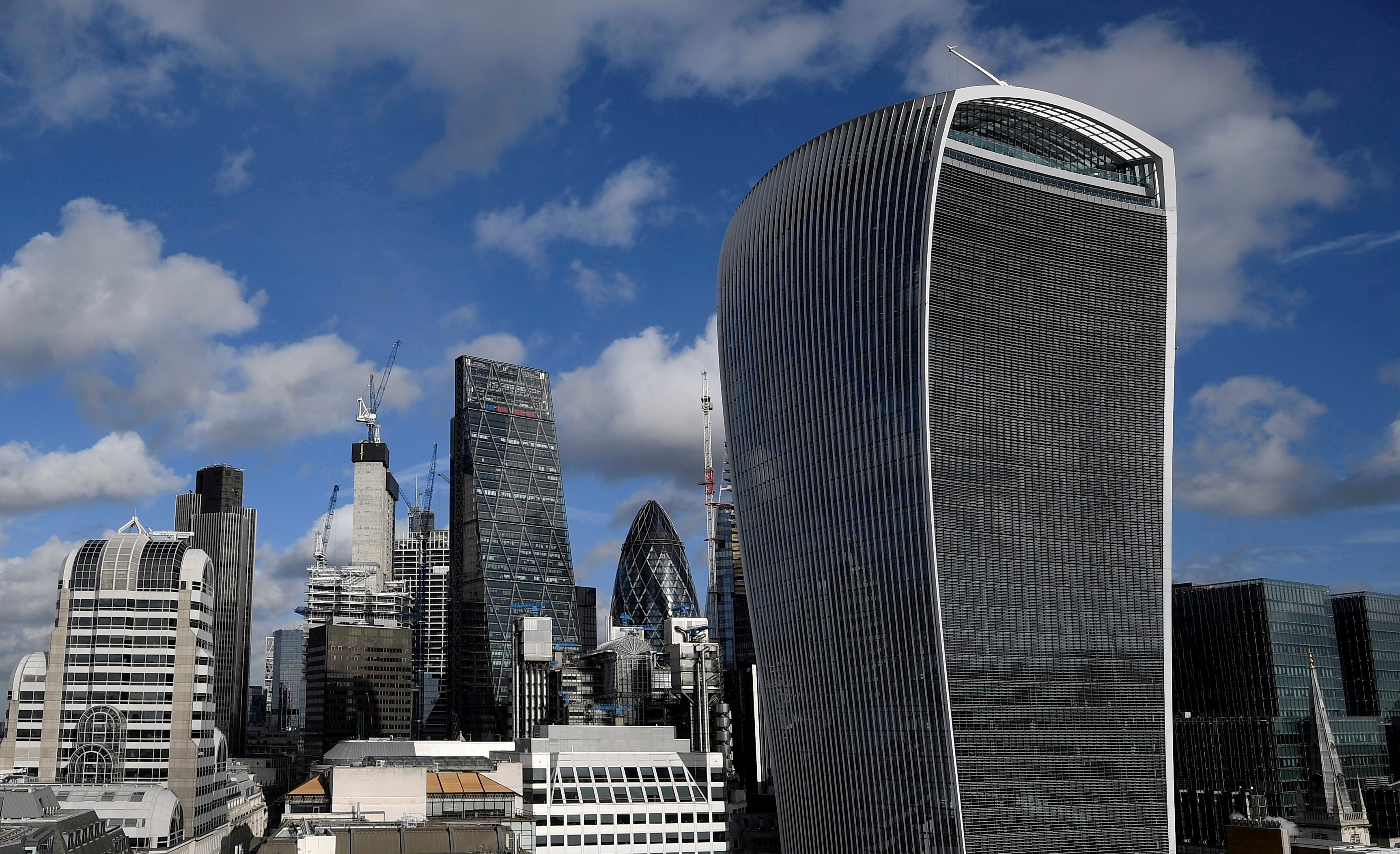 FILE PHOTO: The City of London financial district is seen with office skyscrapers commonly known as 'Cheesegrater', 'Gherkin' and 'Walkie Talkie' seen in London, Britain