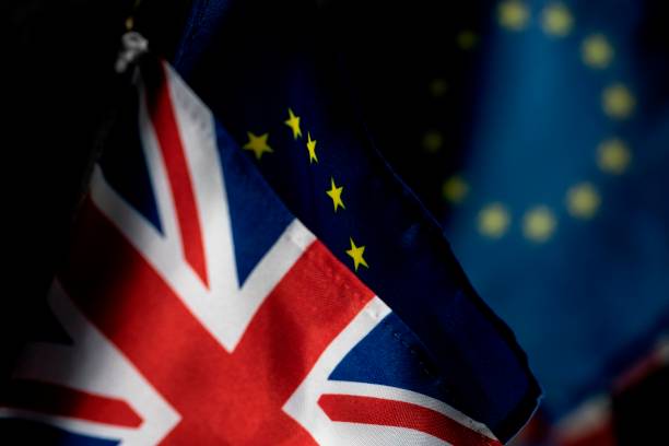 The Union Jack and EU flags.