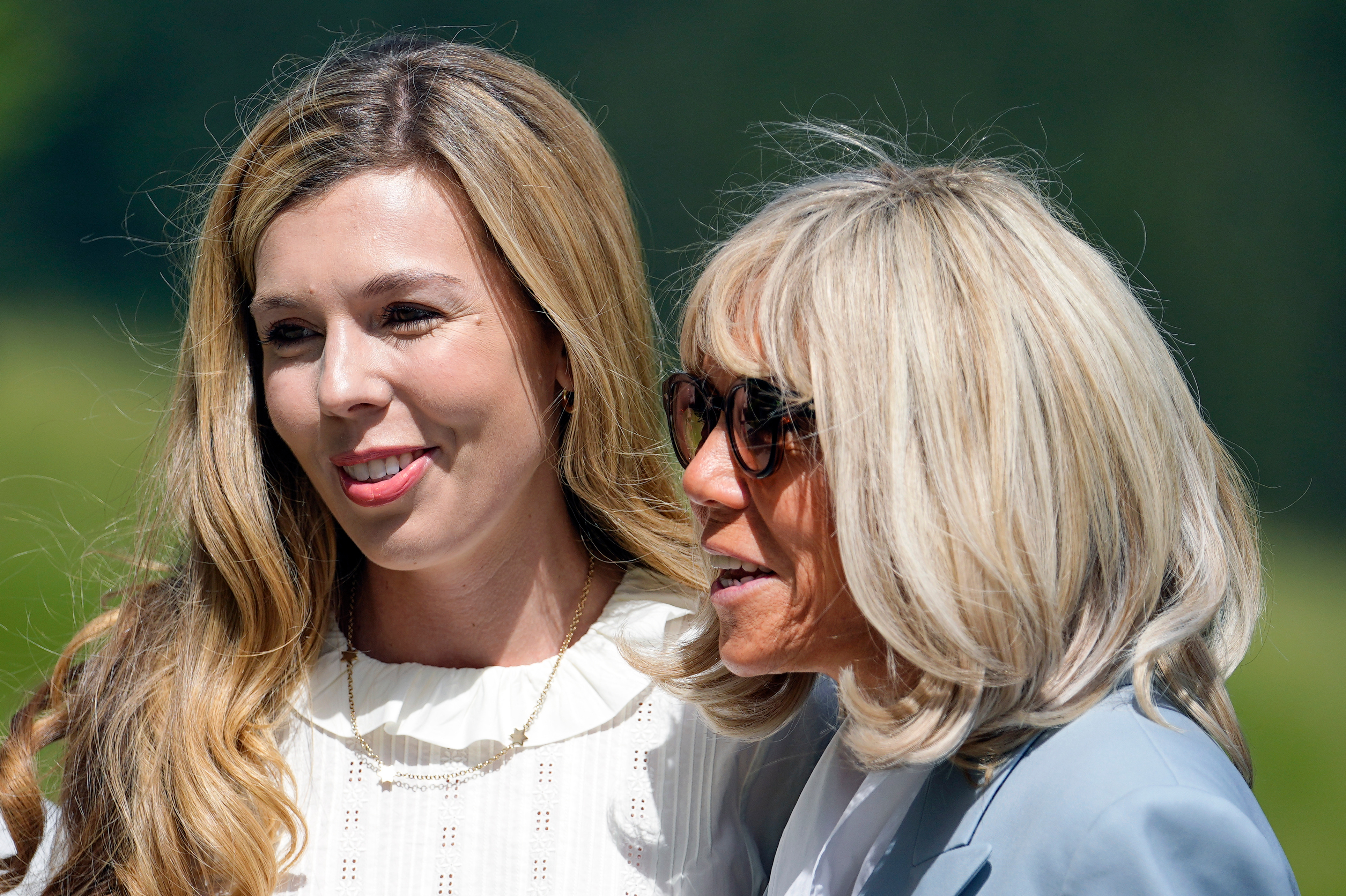 Carrie Johnson and Brigitte Macron, from left, near the Elmau Castle in the mountains around Garmisch-Partenkirchen
