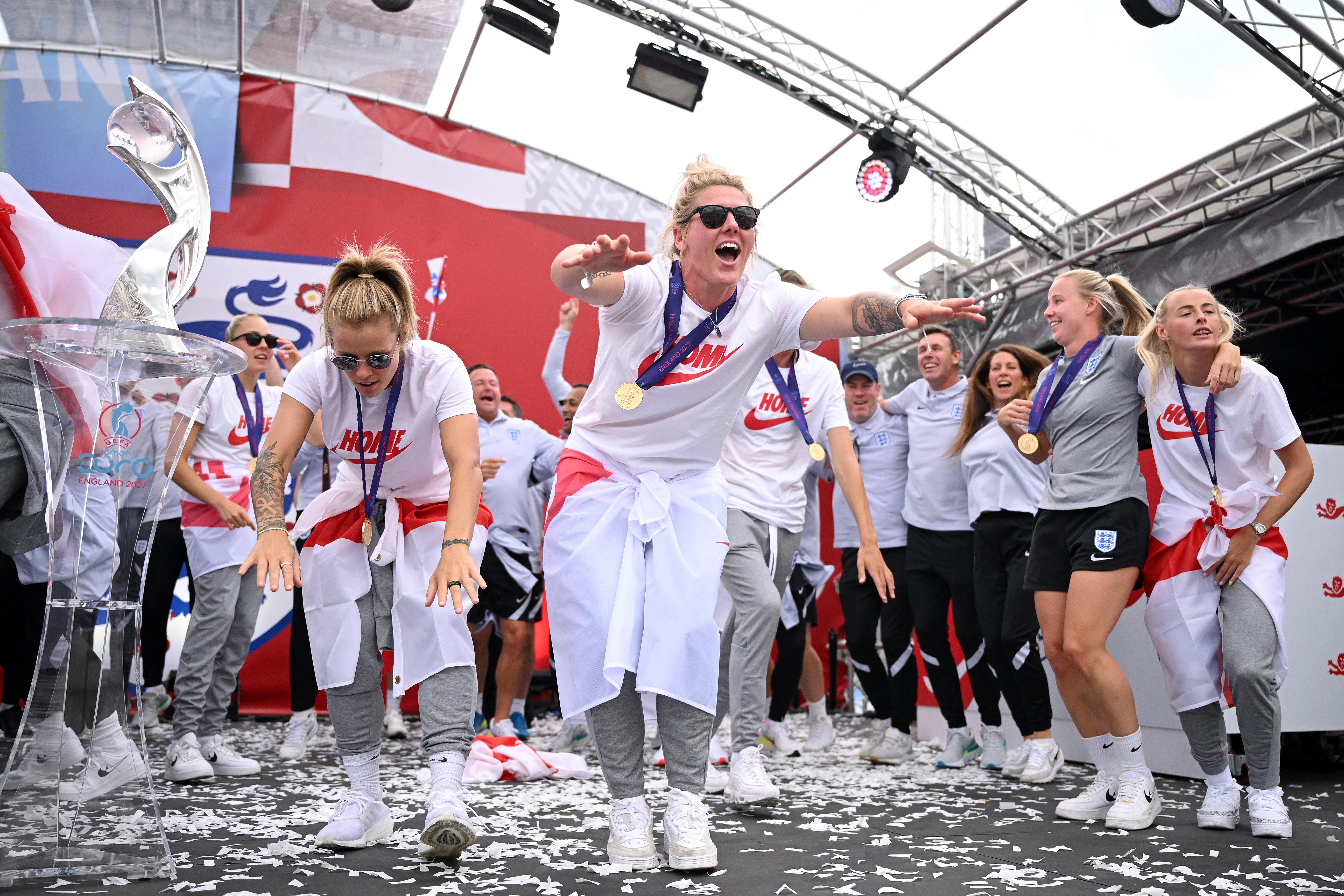 The Lionesses Lift The UEFA Women's Euro Trophy In Victory Celebration For Fans