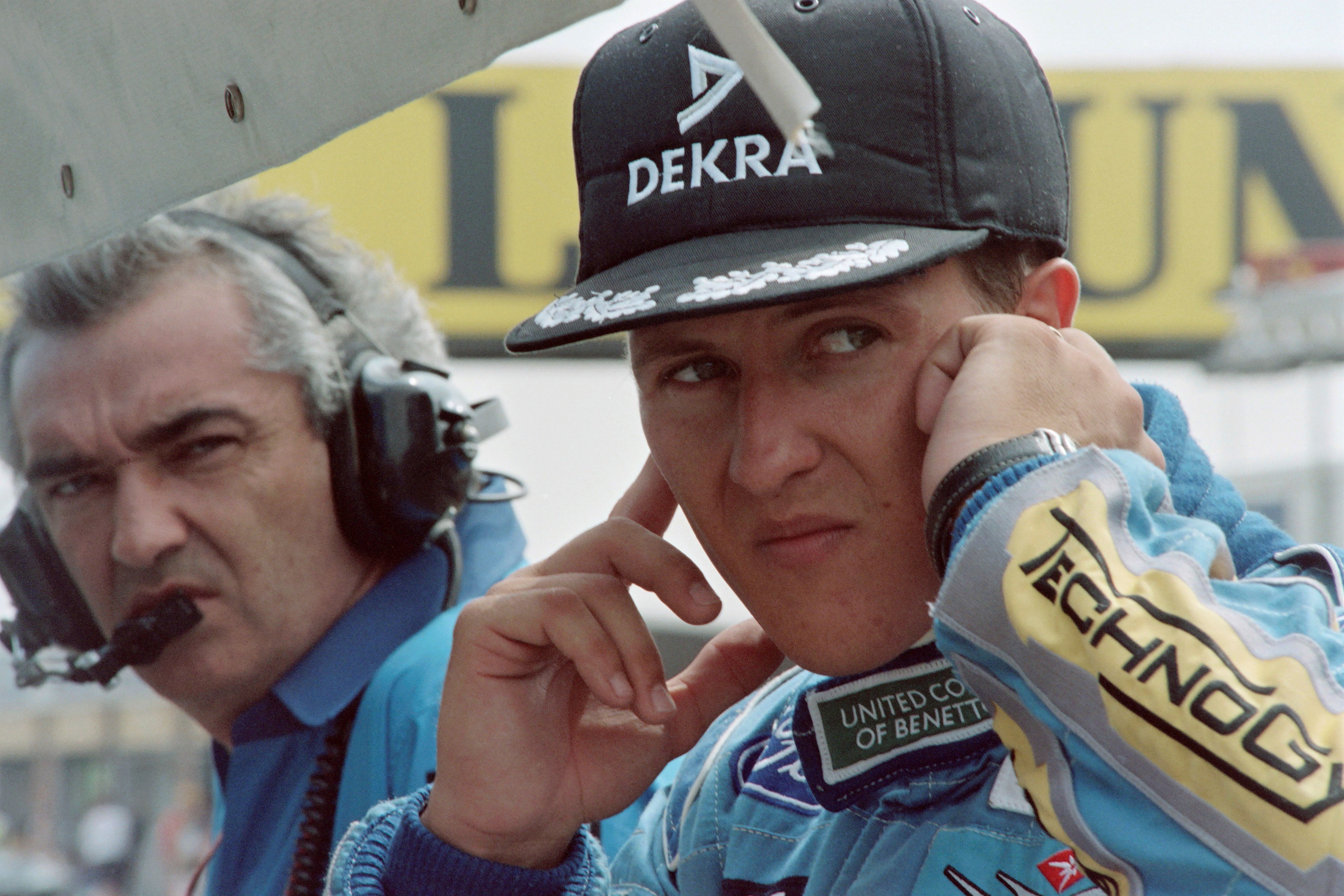 Michael Schumacher puts his fingers in his ears 