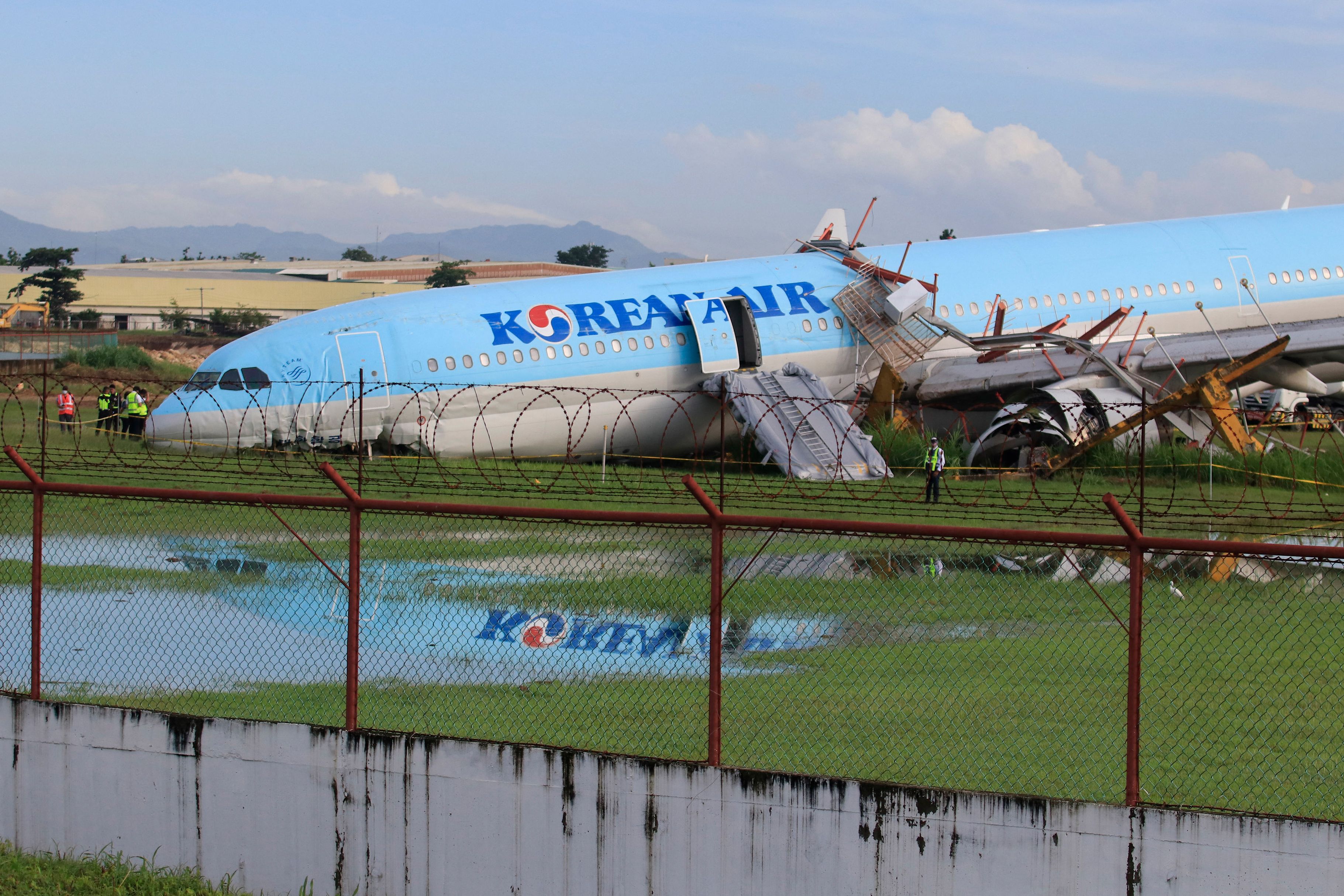 Korean Air plane crashes after overshooting runway in Philippines