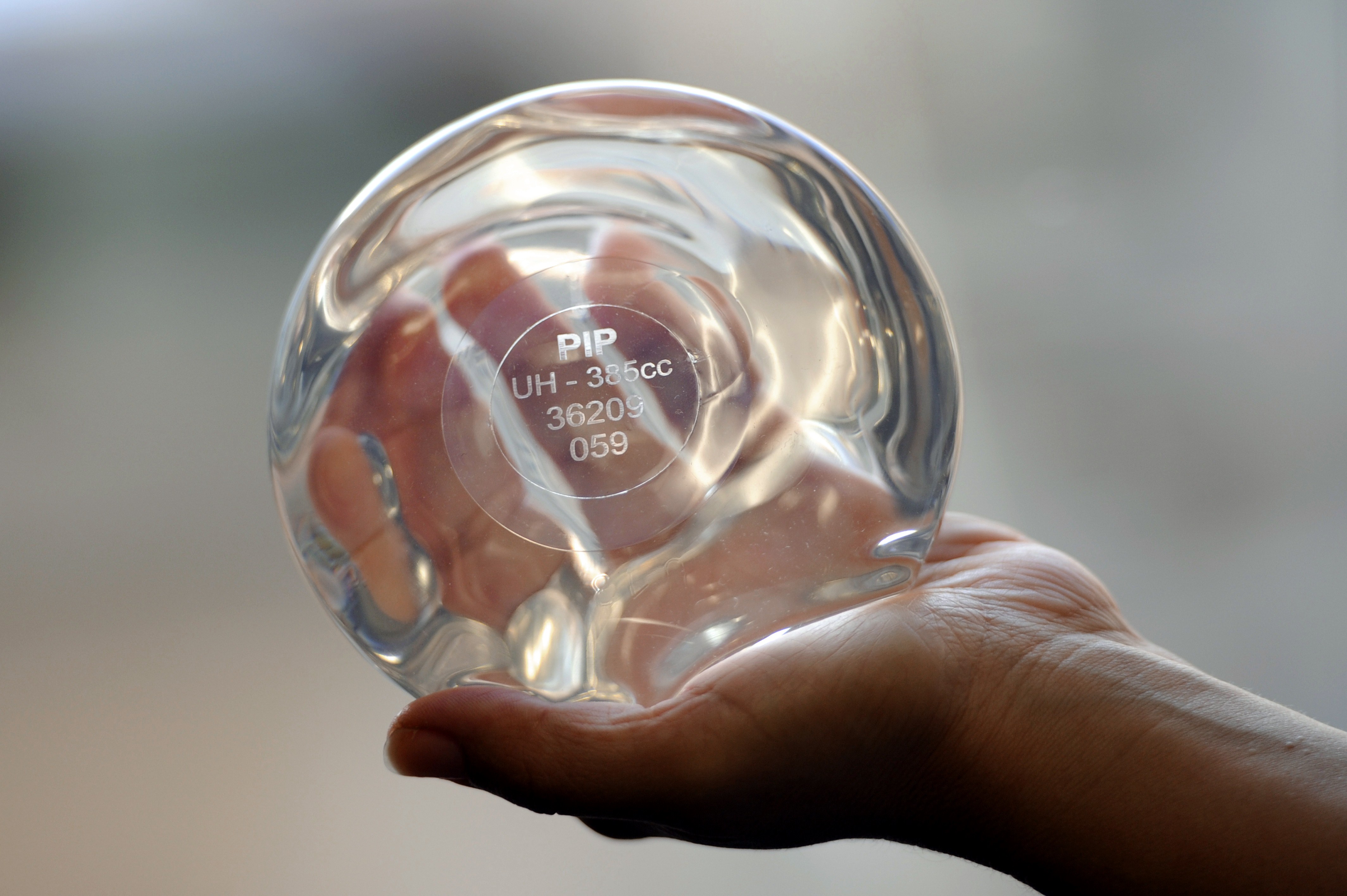 Health minister to consider stronger warnings of cancer link to breast implants