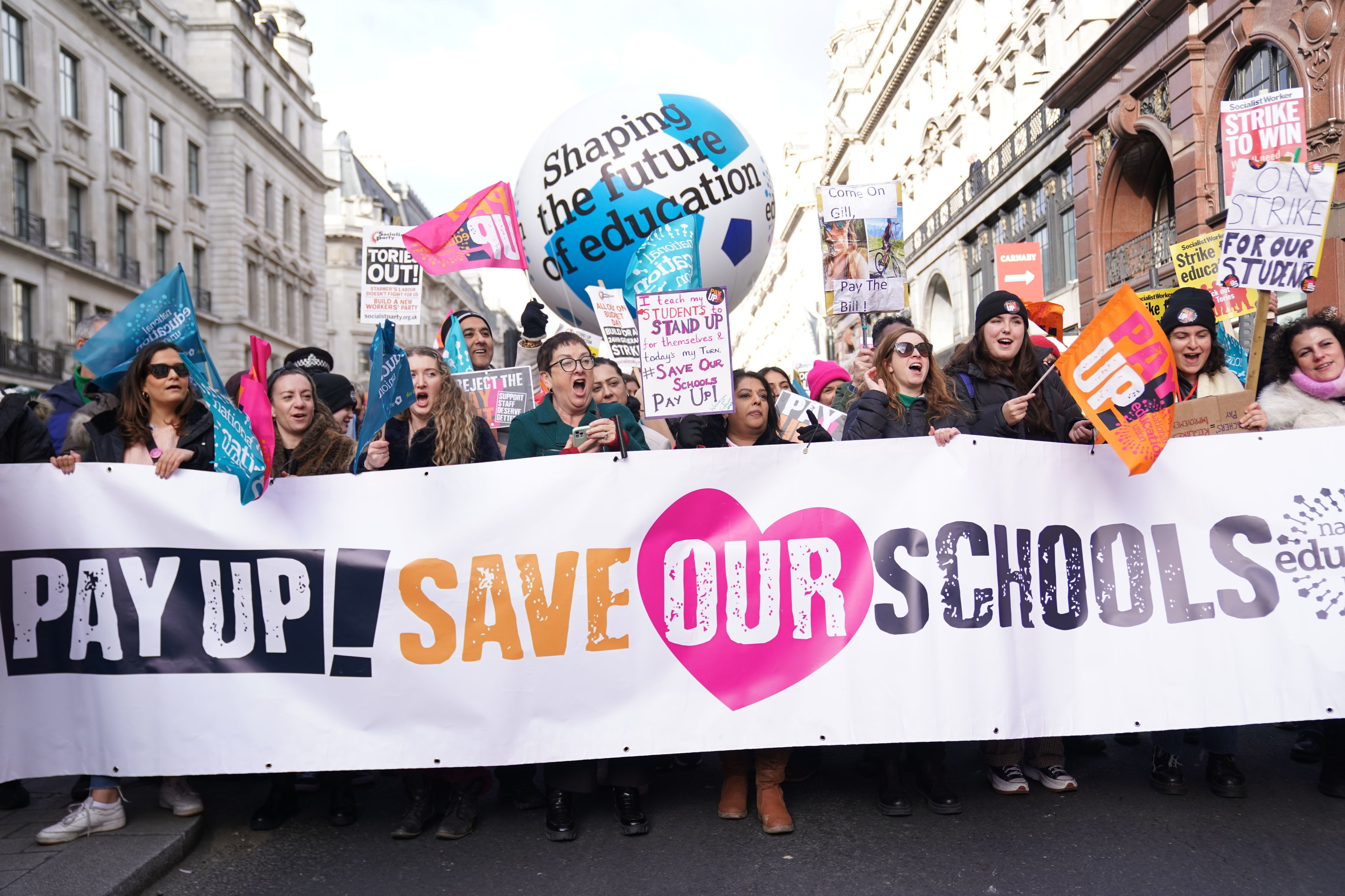 How much do teachers earn as they vote to strike over pay?