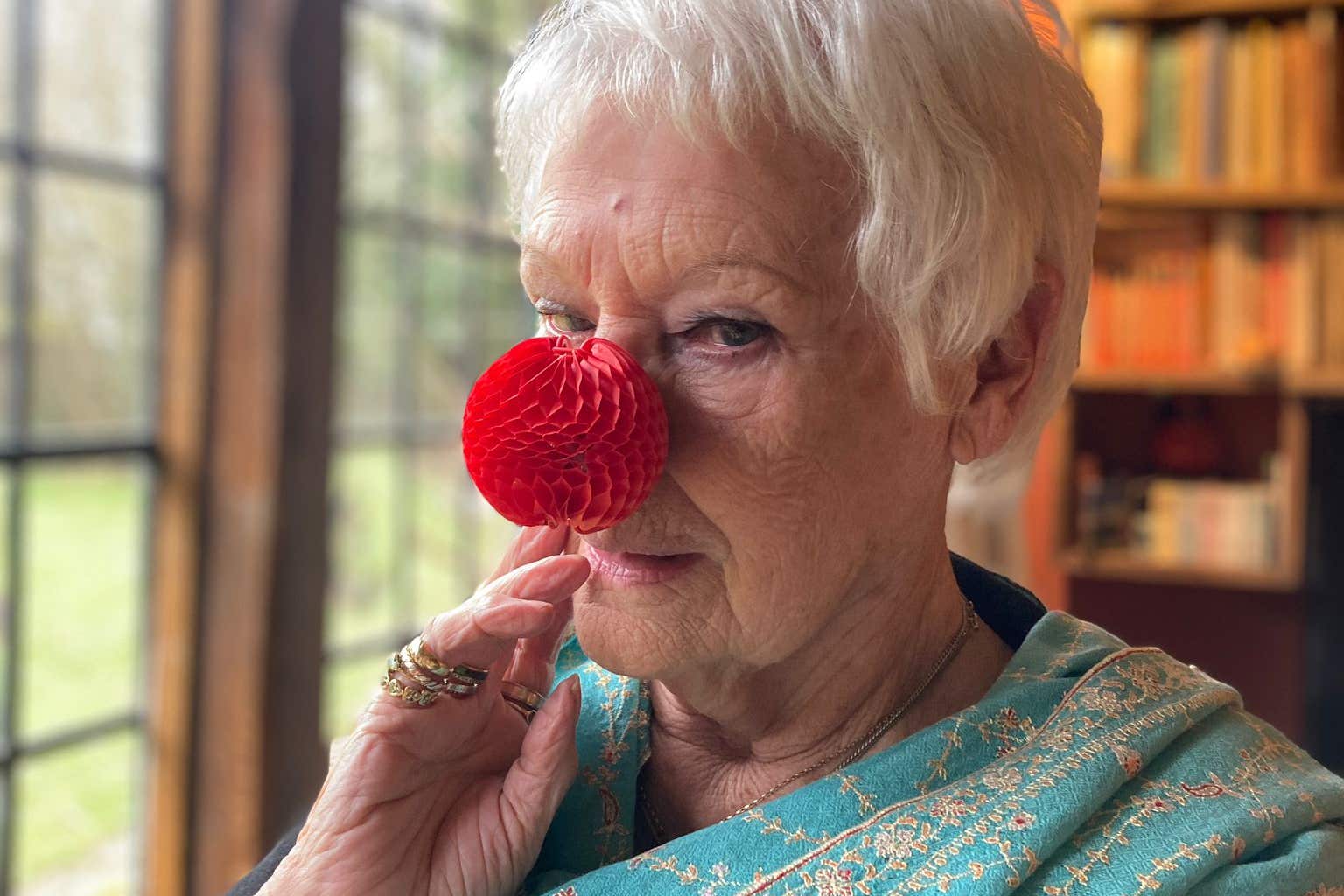 Dame Judi Dench wears ‘very clever’ red nose for Comic Relief