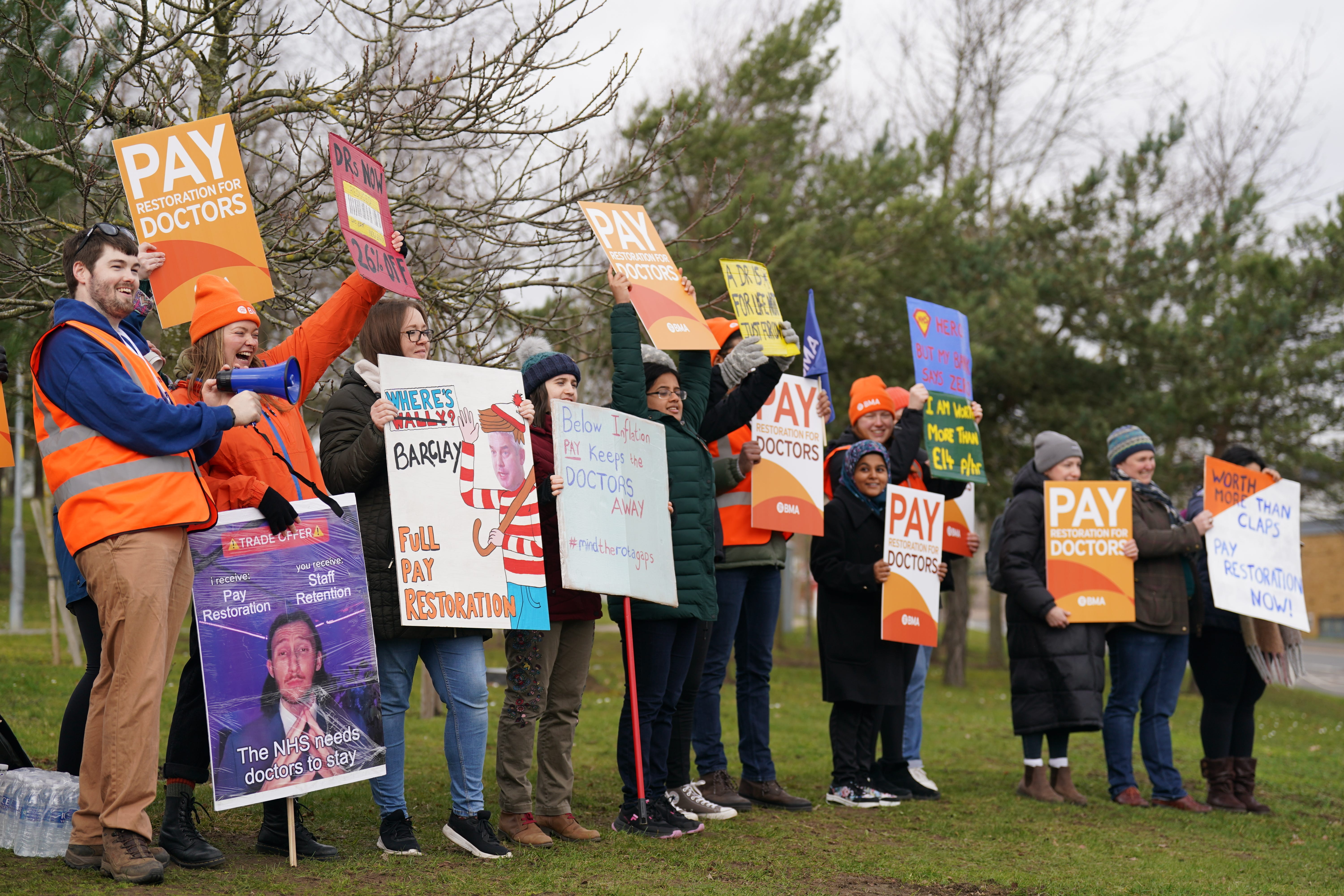 ‘We’re not worth 26% less’ – junior doctors take to picket lines