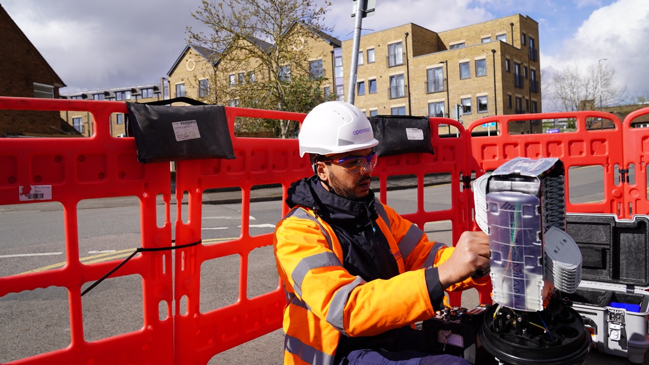 Openreach engineer installing fibre broadband 