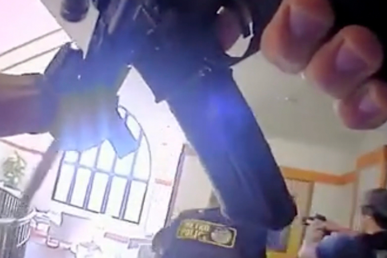 Bodycam video shows moment school attacker shot dead by police 