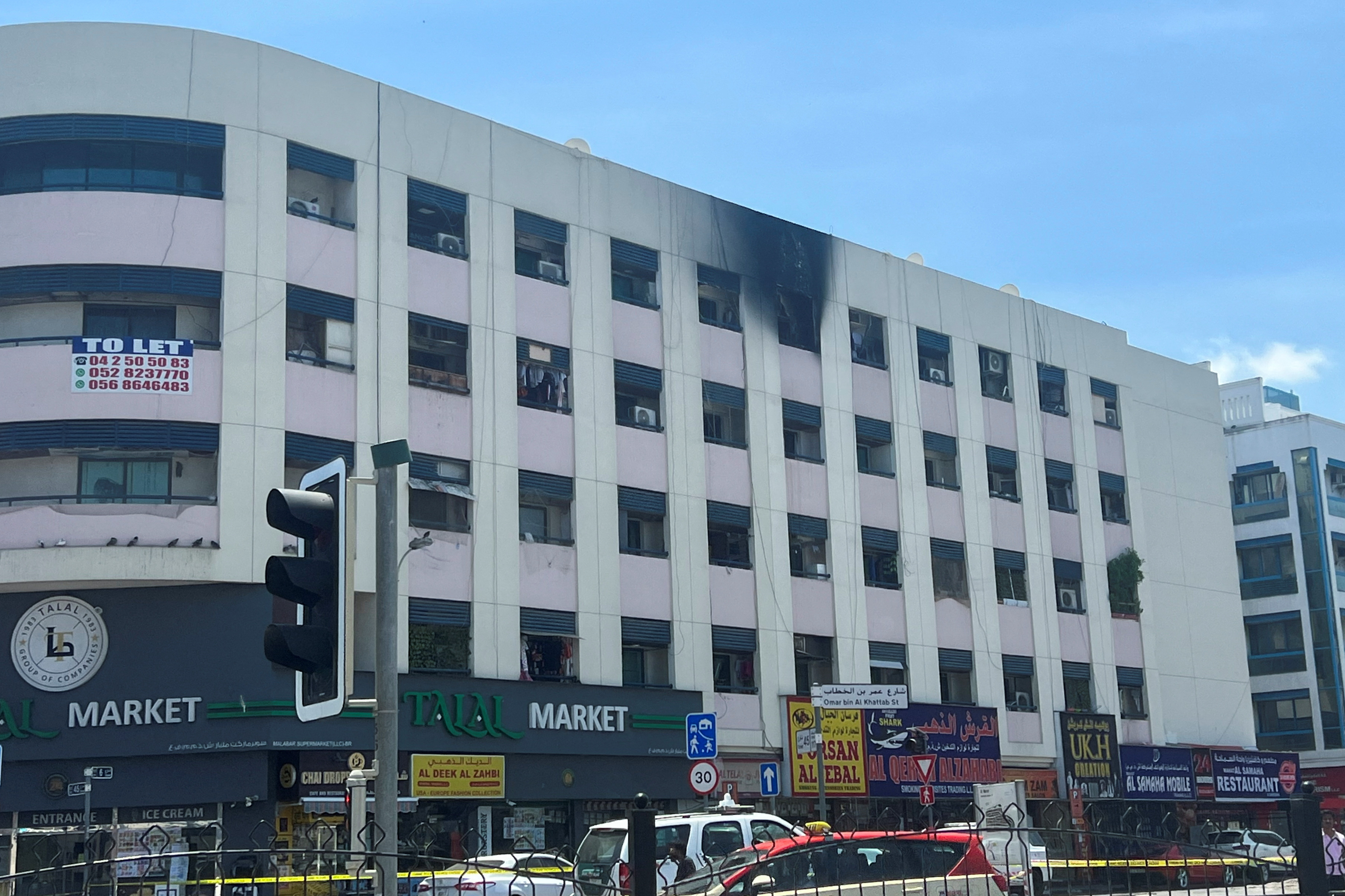 Smoke marks caused by a fire are seen on the exterior of a building in Dubai,
