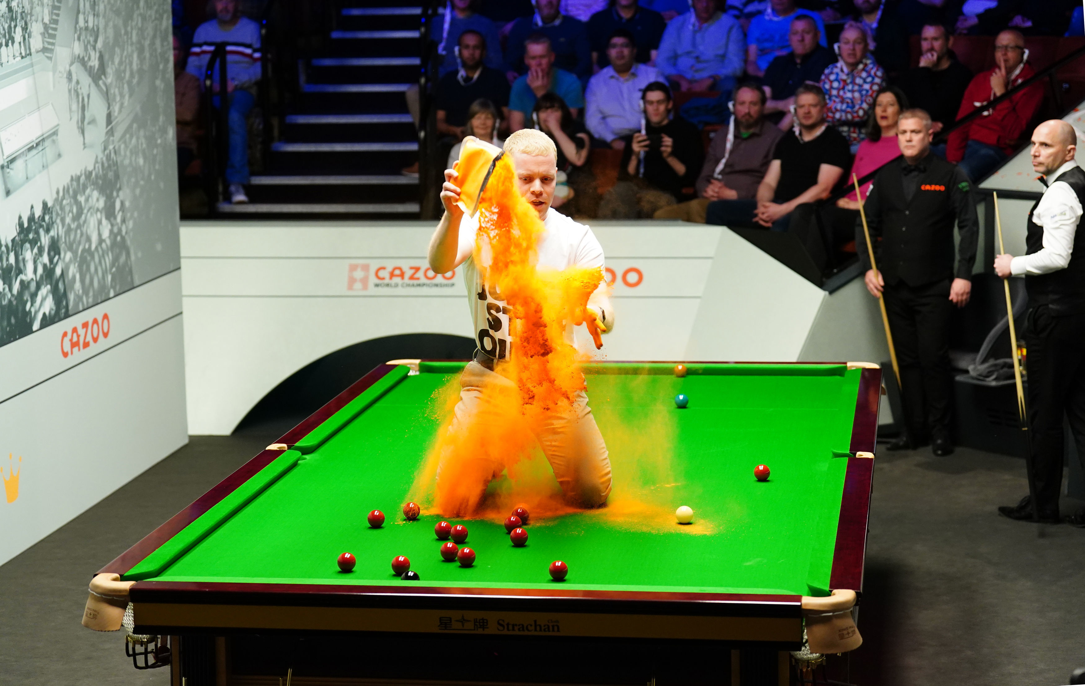 Just Stop Oil protesters storm tables at World Snooker Championship