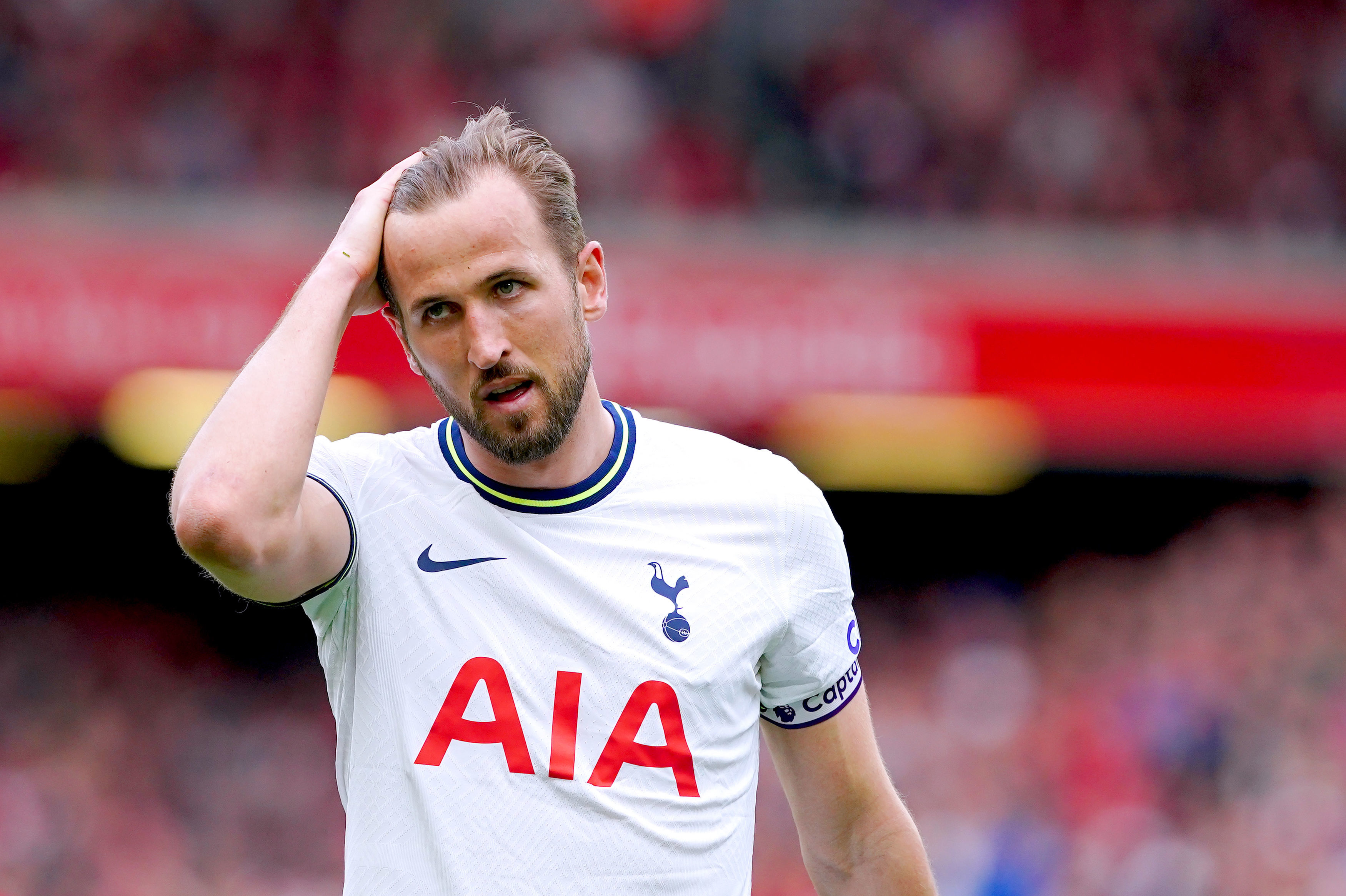 Arsene Wenger tells Harry Kane to STAY at Tottenham this summer