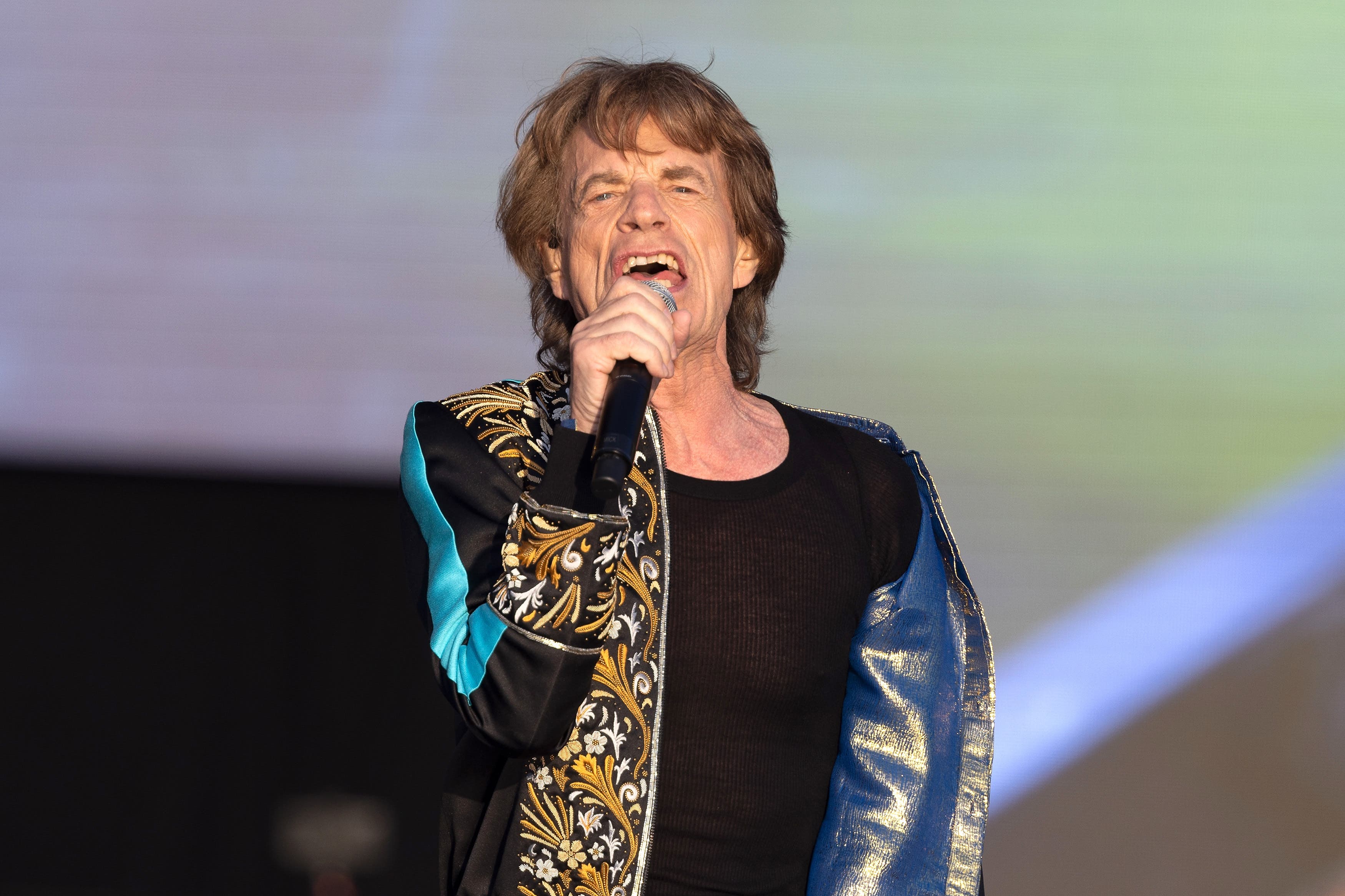 Mick Jagger wears a fake moustache and dresses as a nun in SNL skits