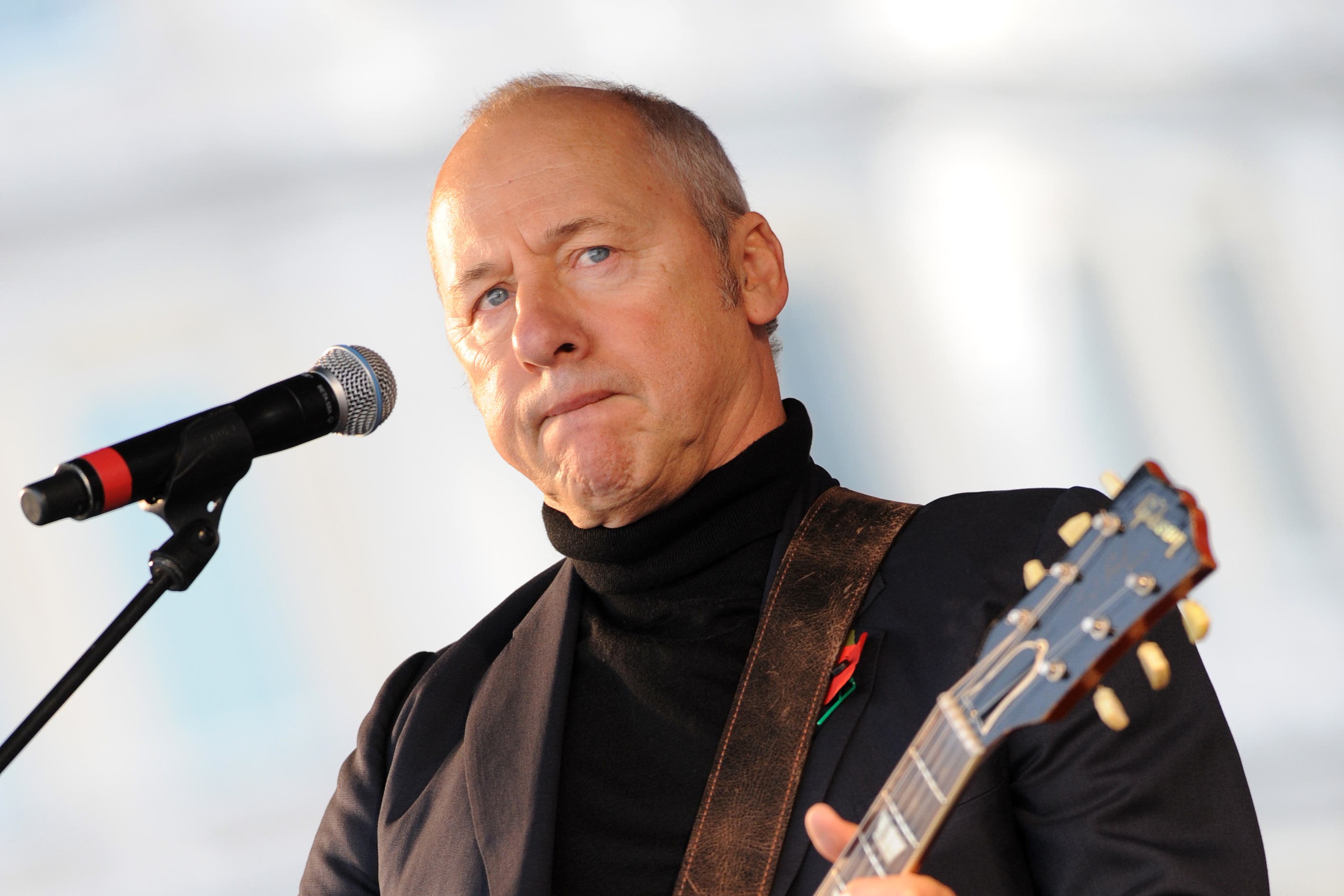Dire Straits star unites world guitar heroes for charity record