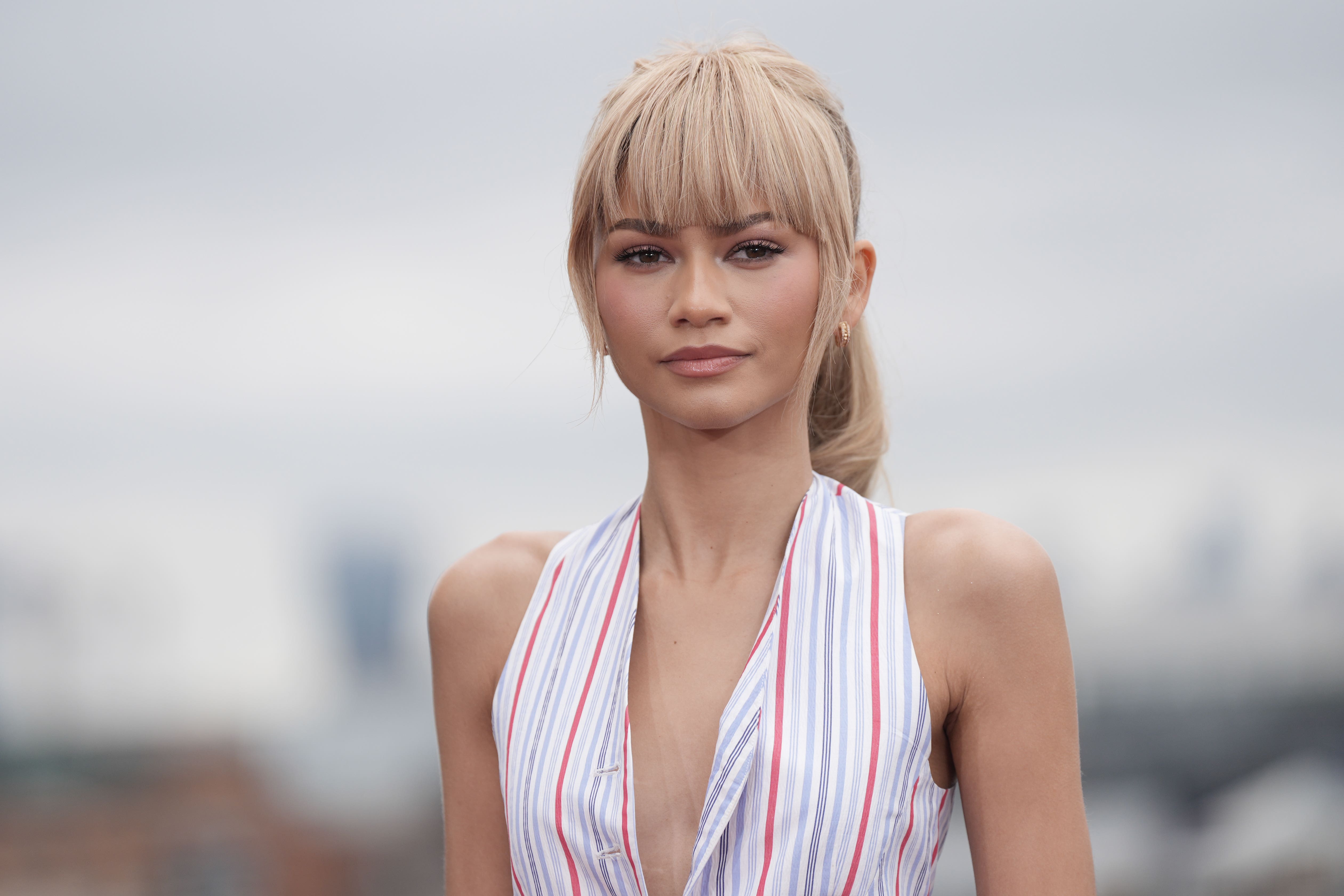 Zendaya wears striped outfit with fluffy tail for Challengers promotion
