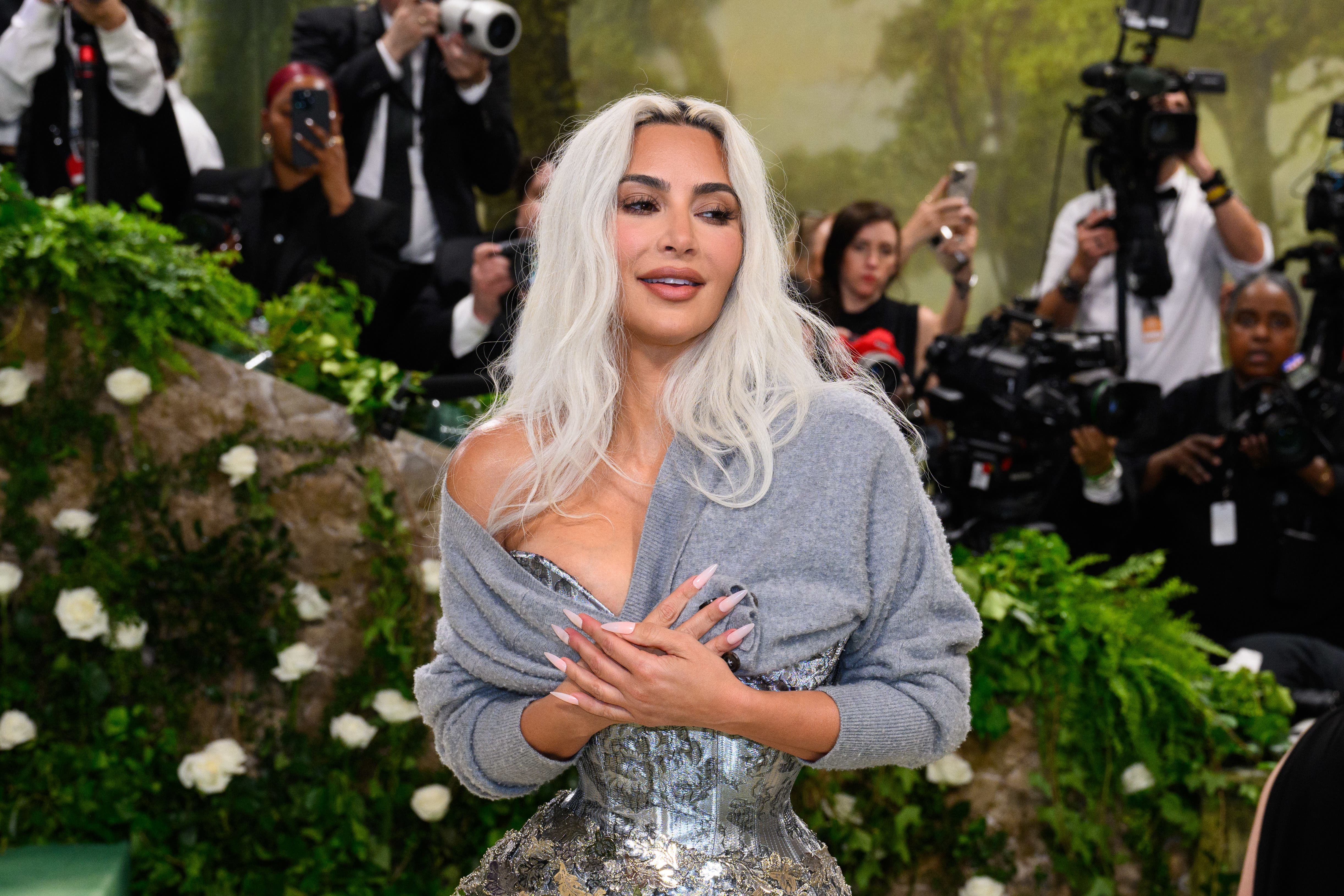 Kim Kardashian says she finds her voice distinct and annoying