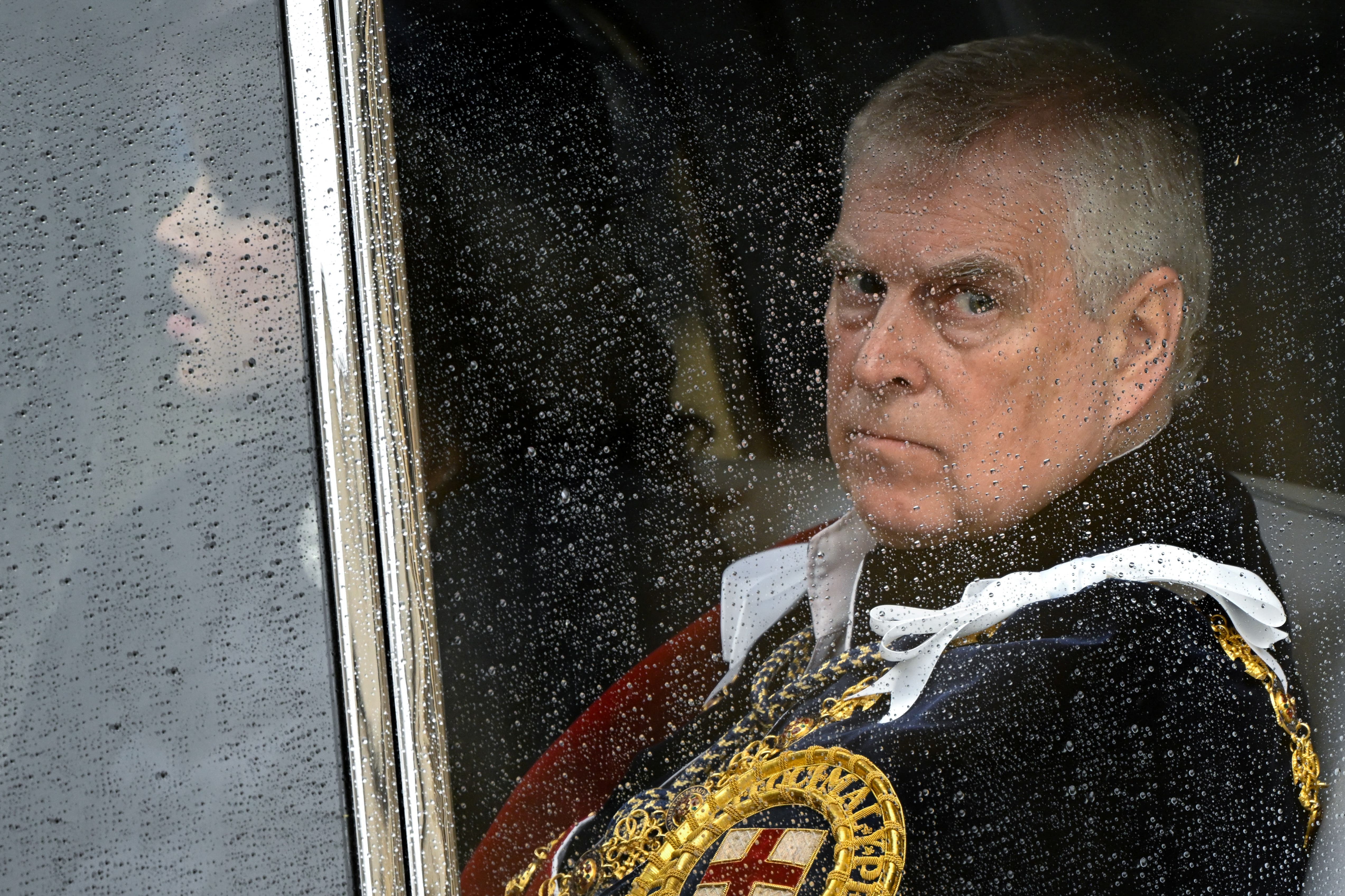 Suspected Chinese spy with close ties to Prince Andrew banned from the UK