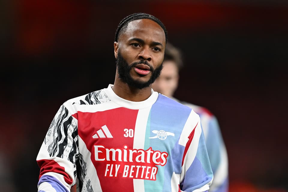 Raheem Sterling warming up for Arsenal