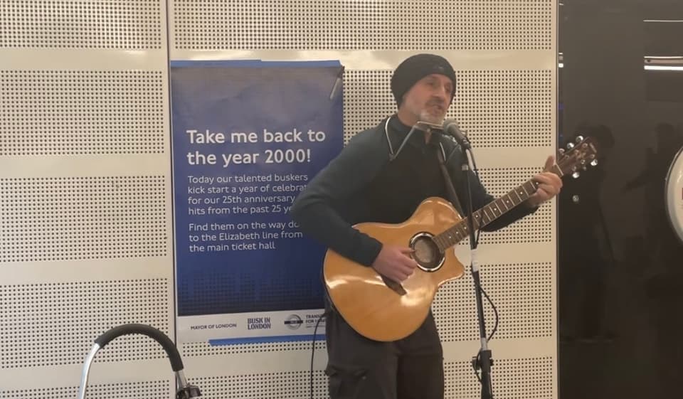 One of 25 buskers playing throughout the day at Liverpool Street station to mark 25 years of TfL
