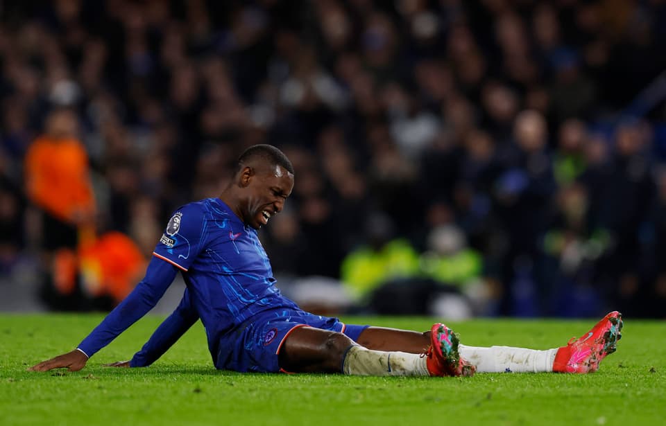 Nicolas Jackson reacts to getting an injury during Chelsea vs West Ham