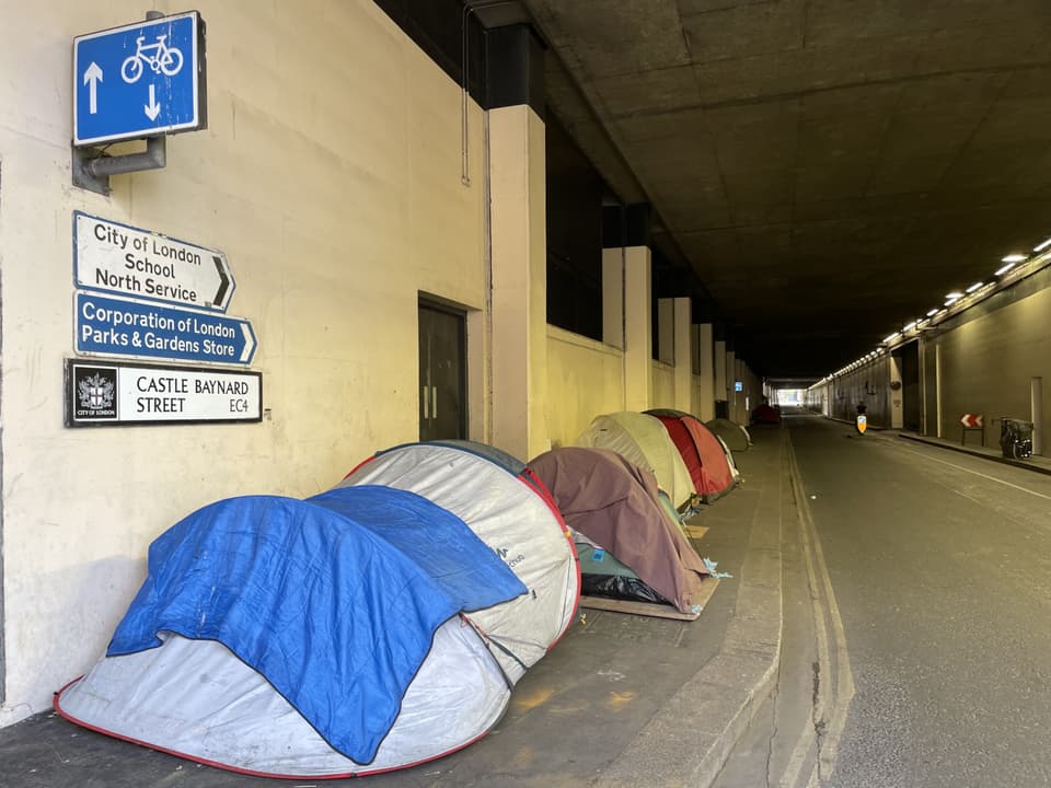 <p>Homeless: Castle Baynard Street in the City of London is lined with tents</p>