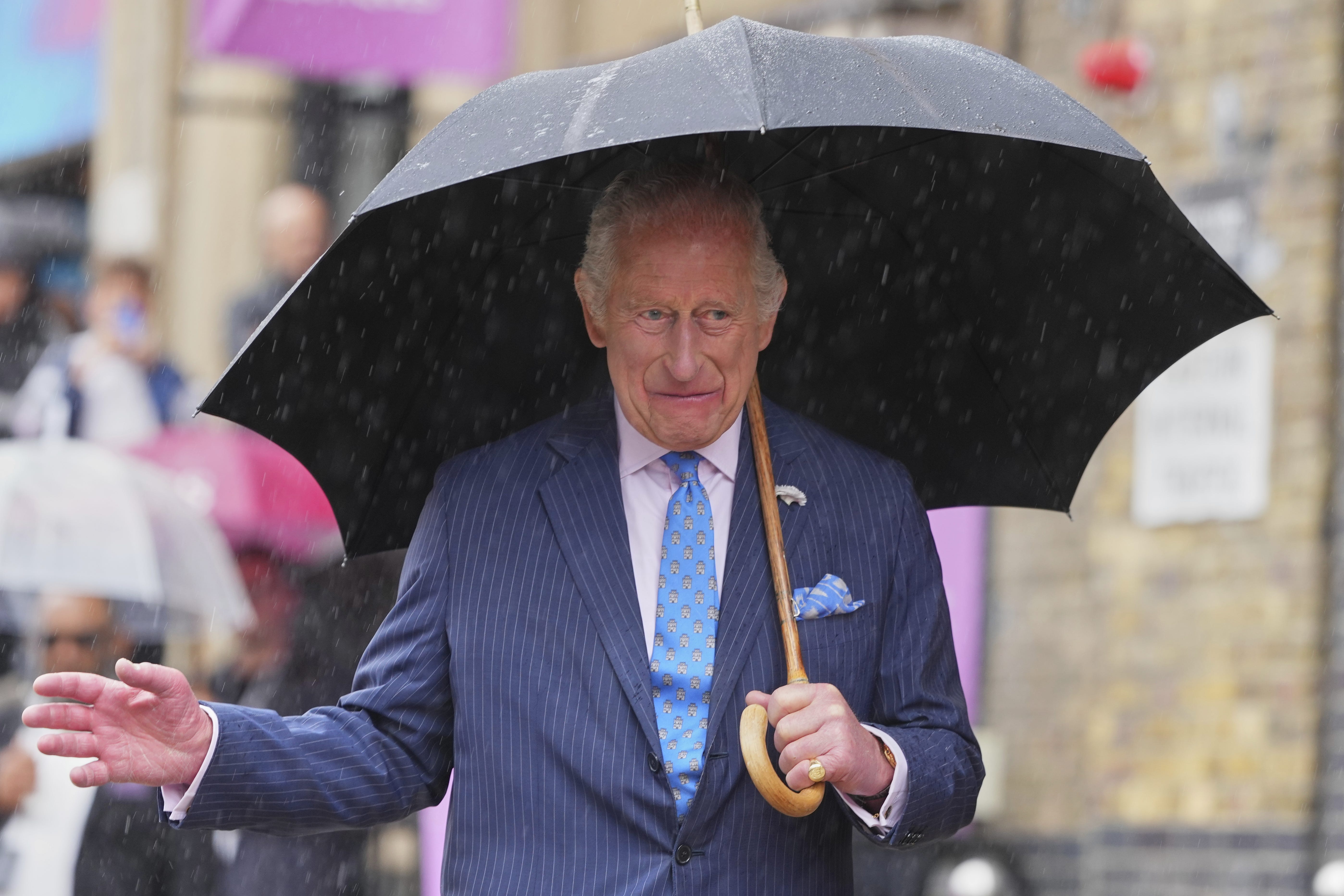 King braves showers as he visits SXSW festival and London market 
