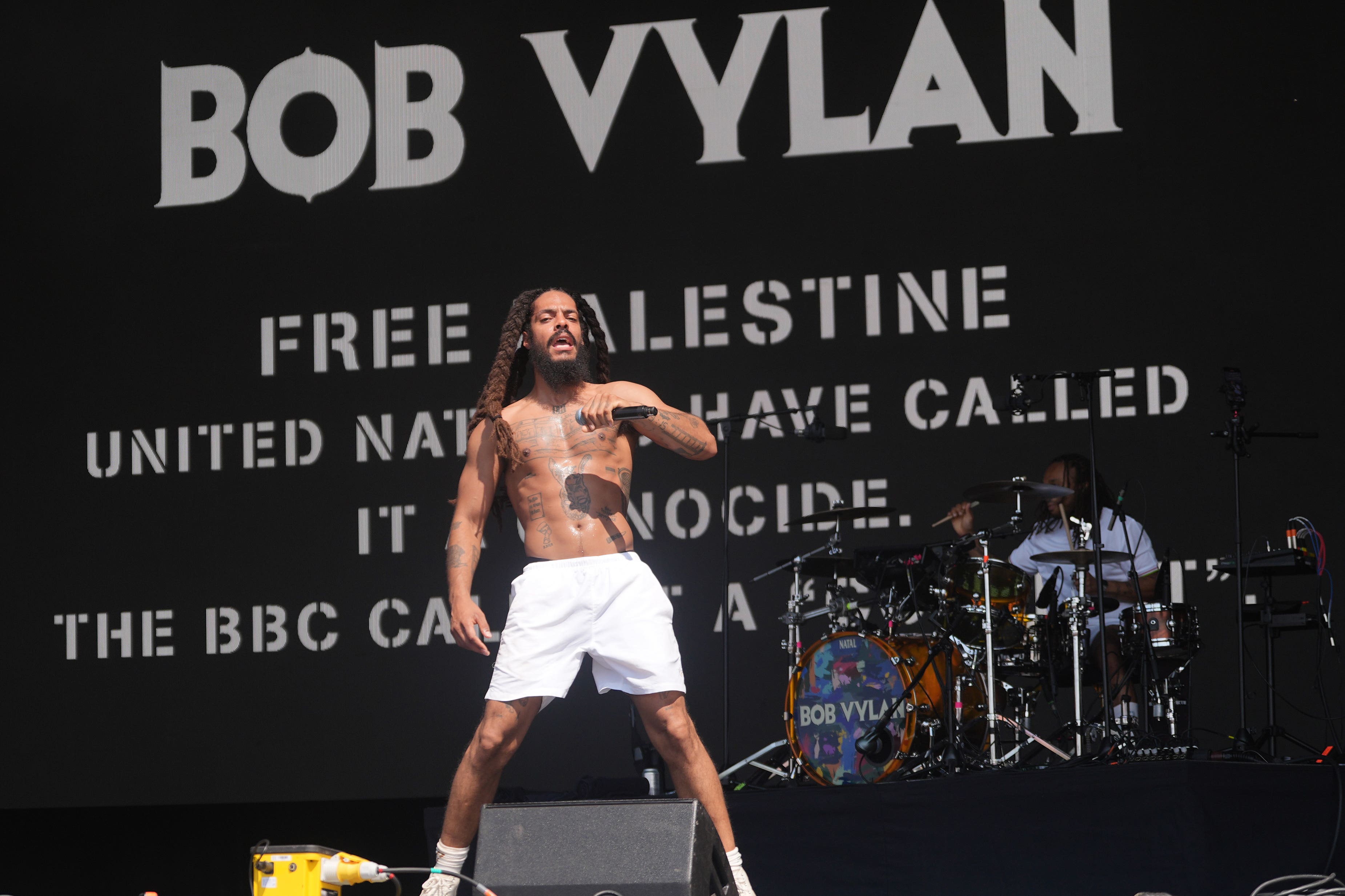 Glastonbury says chants by Bob Vylan ‘crossed the line’ as police assess footage