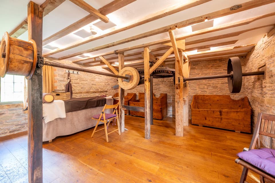 Dent restored the old mill and integrated the old parts into the design of her yoga studio