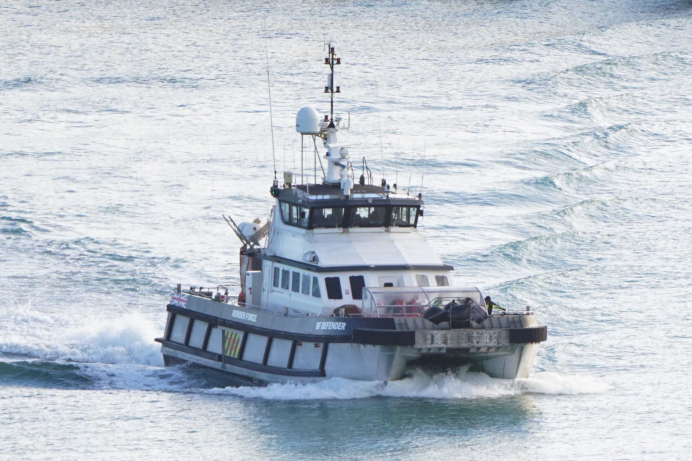 Migrants arrive in UK wearing blankets after crossing English Channel