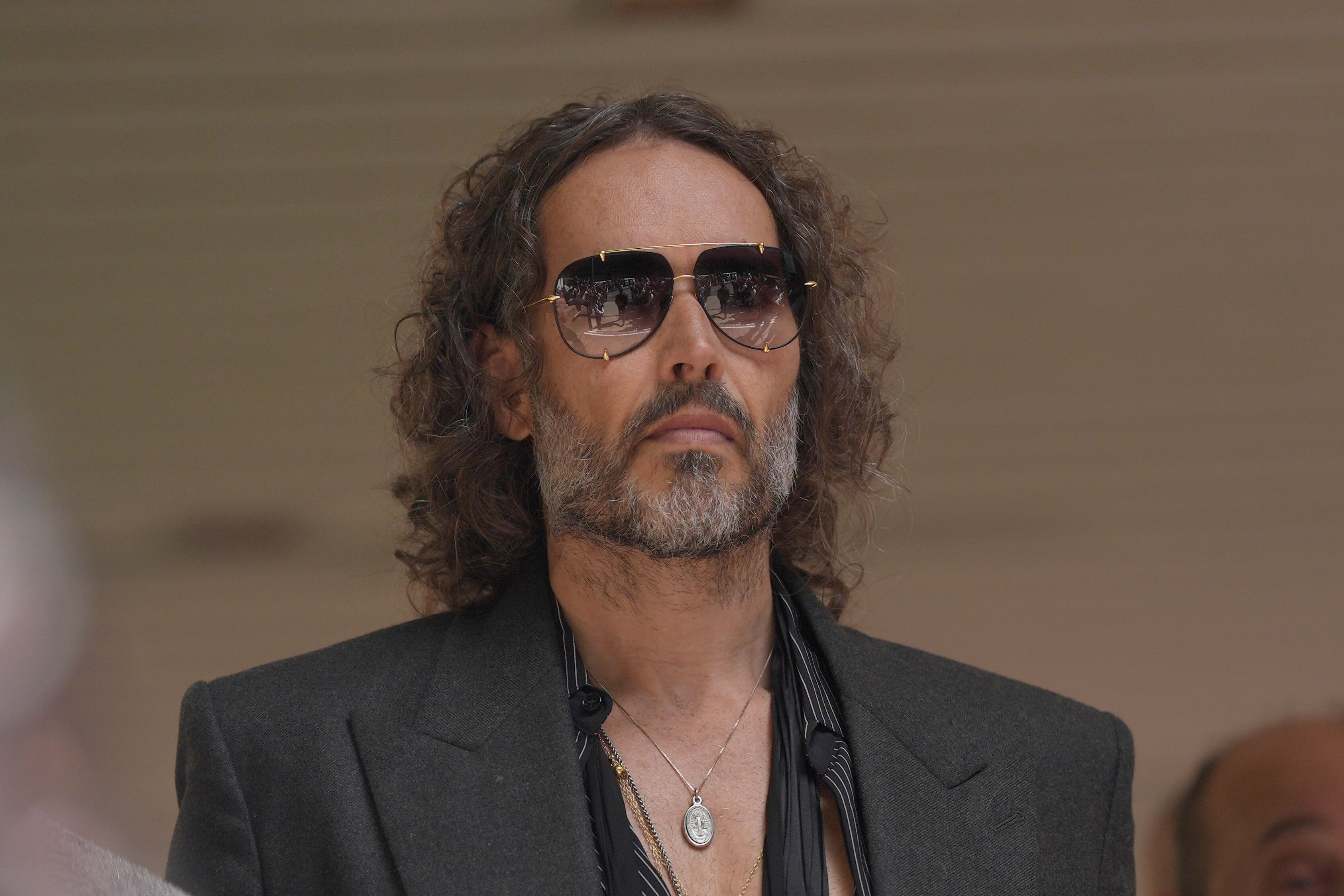 Russell Brand appears in court charged with further sex offences
